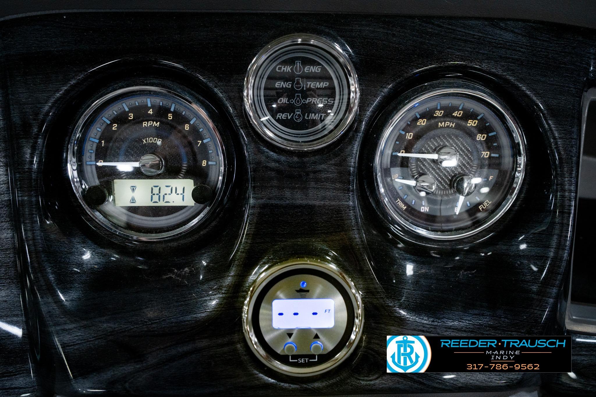 Dashboard of 2025 Avalon 2385 LSZ ENT with RPM and speed gauges.