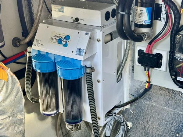 Water filtration system in 2022 Aquila 44 yacht engine room.