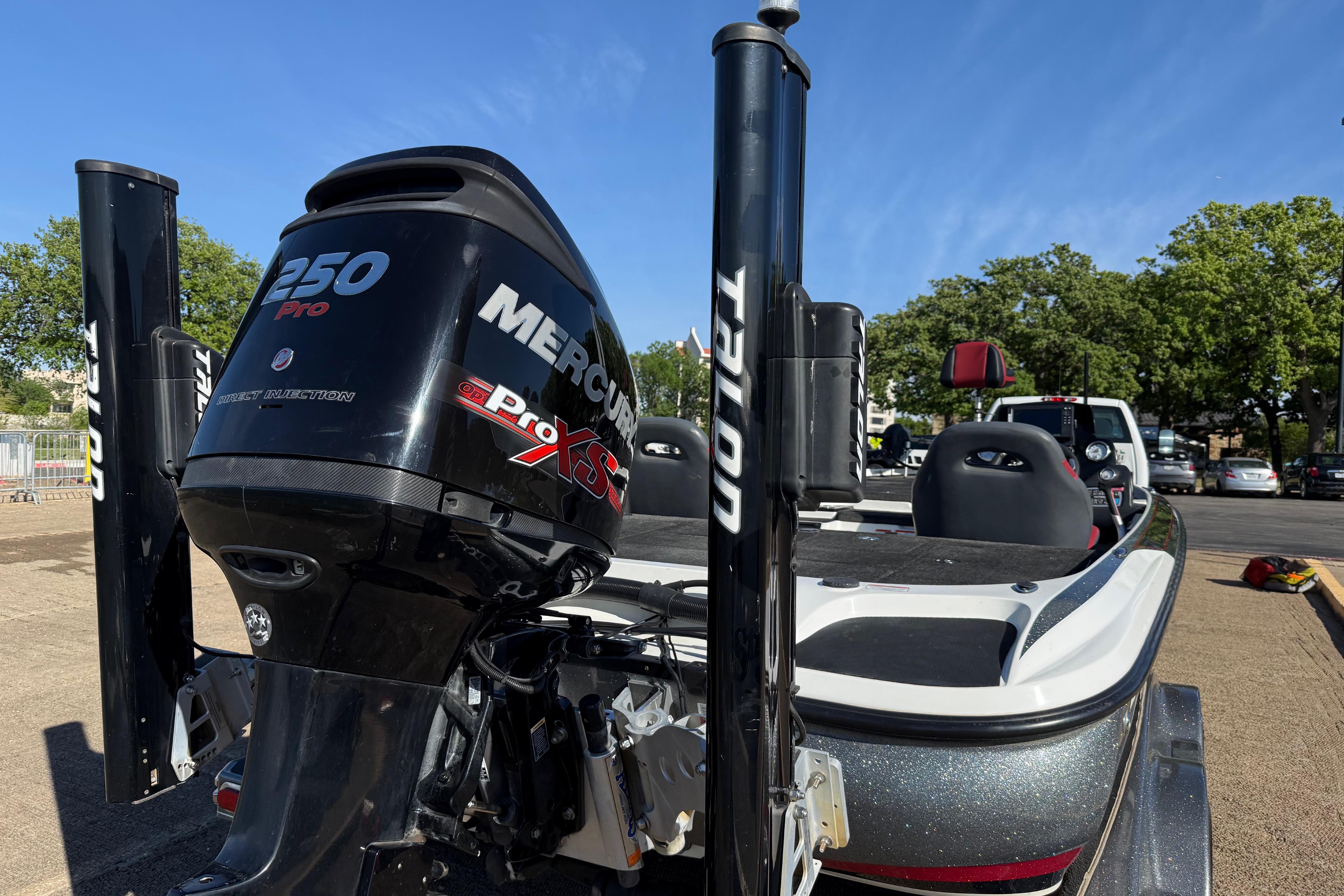 2016 Nitro Z21 boat with Mercury 250 Pro XS engine, parked outdoors.