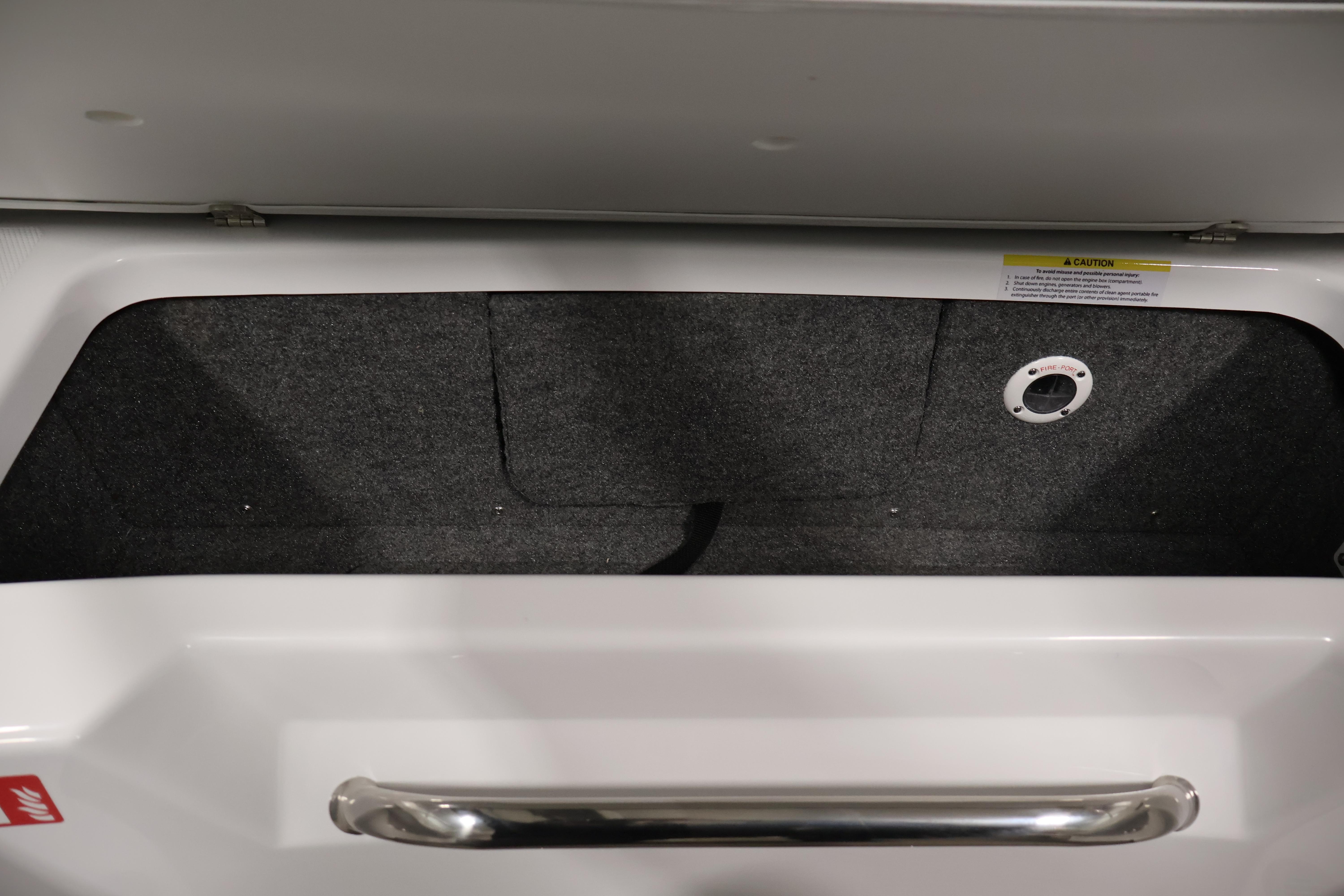Storage compartment of 2026 Four Winns H4 Freedom boat, featuring a sleek handle design.