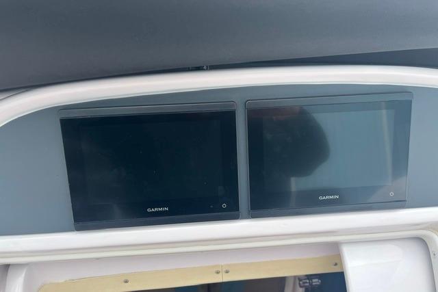 Dashboard of a 2000 Donzi 33 ZX with dual Garmin displays.