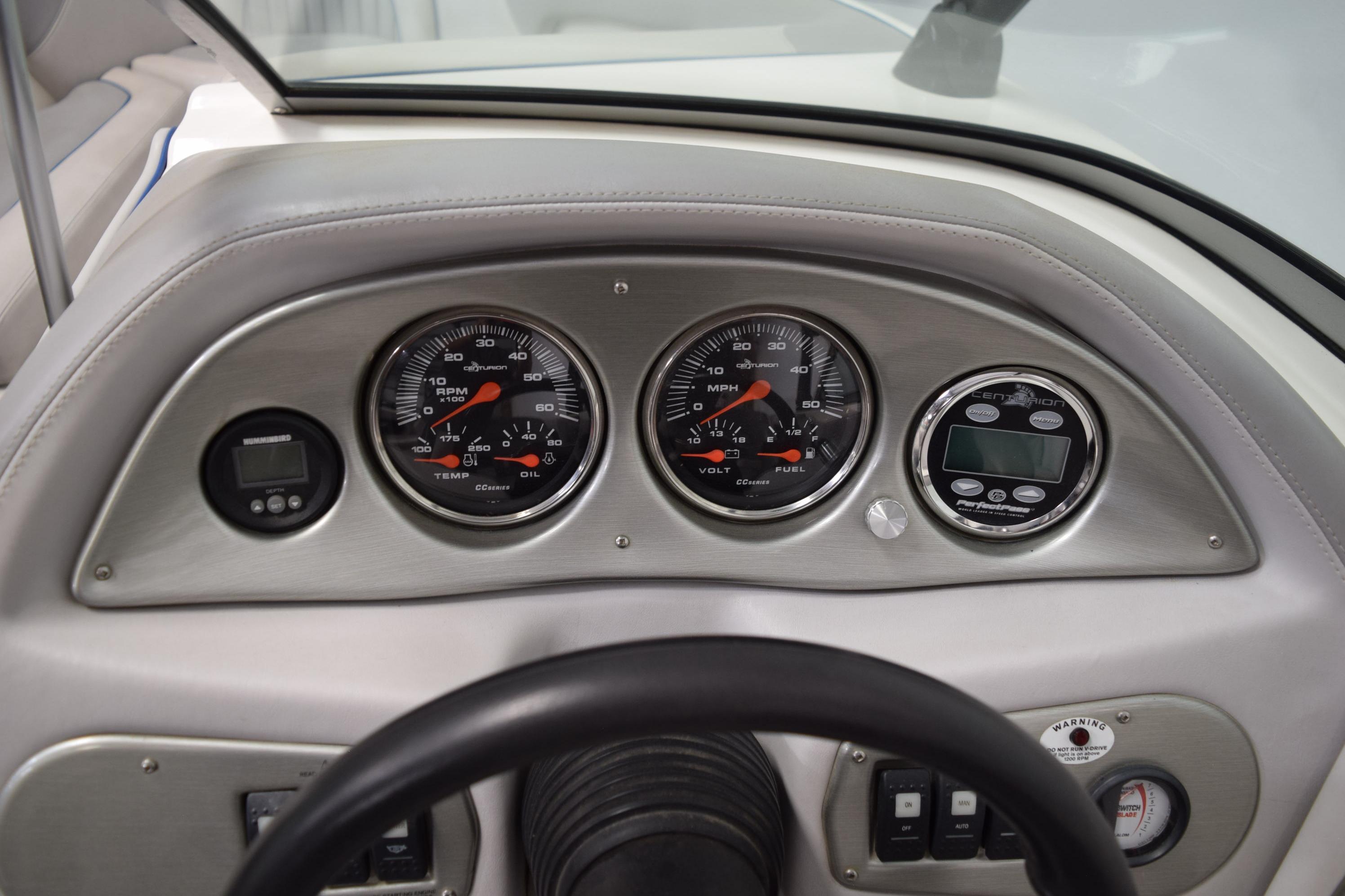 Dashboard of a 2007 Centurion SV 240 boat with gauges and controls.