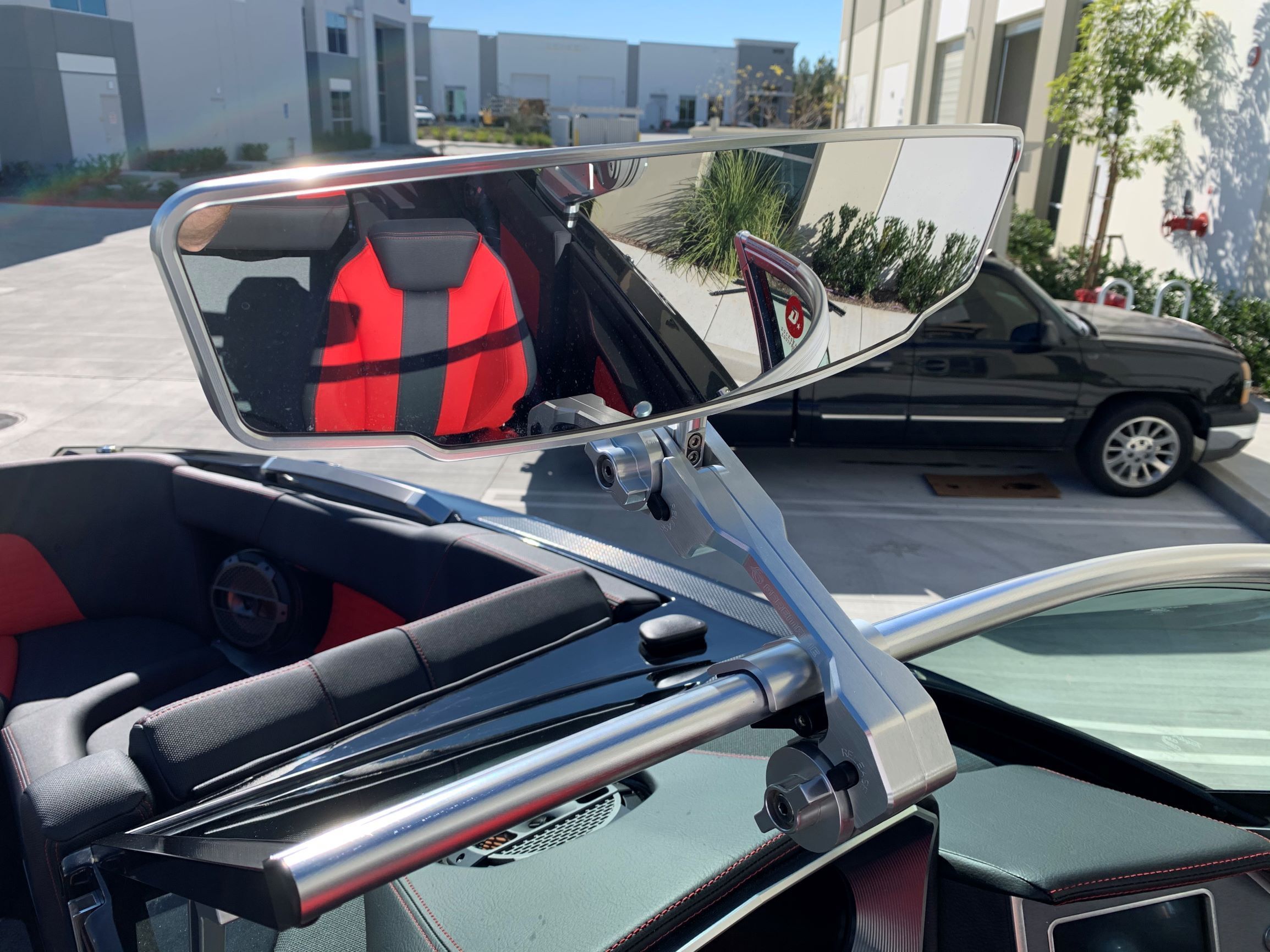 Close-up of a rearview mirror on a 2020 MasterCraft X24 boat.