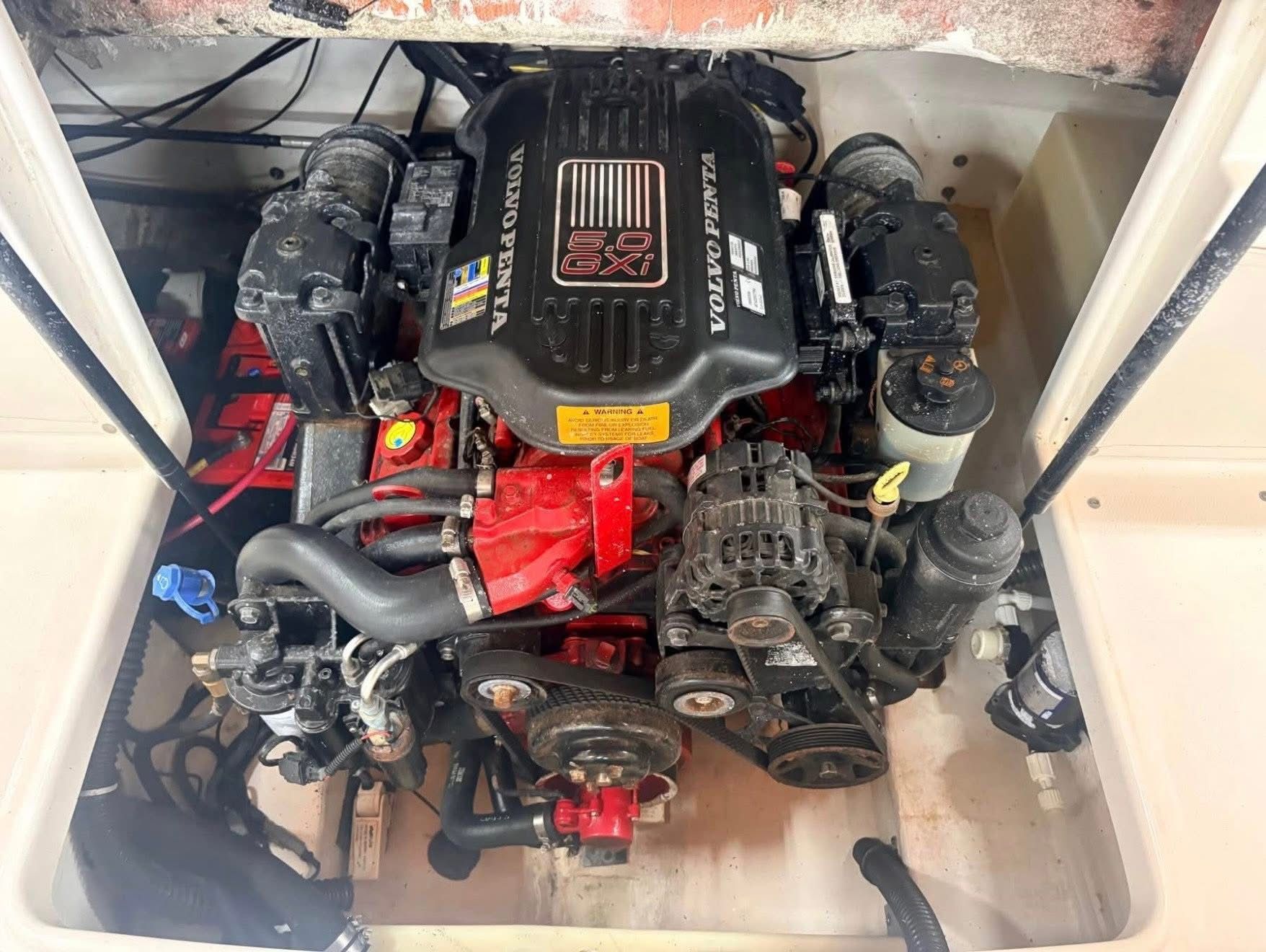 Engine compartment of a 2009 Chaparral 220 SSi with a Volvo Penta engine.