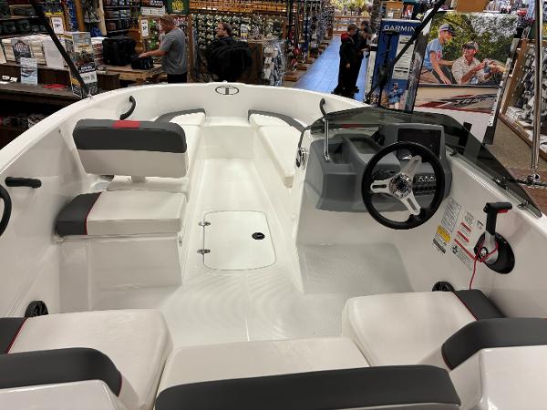 2023 Tahoe T16 boat interior with seating and steering console.