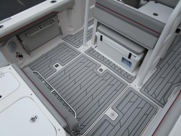 2025 Solara S-250 CW boat interior with gray non-slip flooring and seating.
