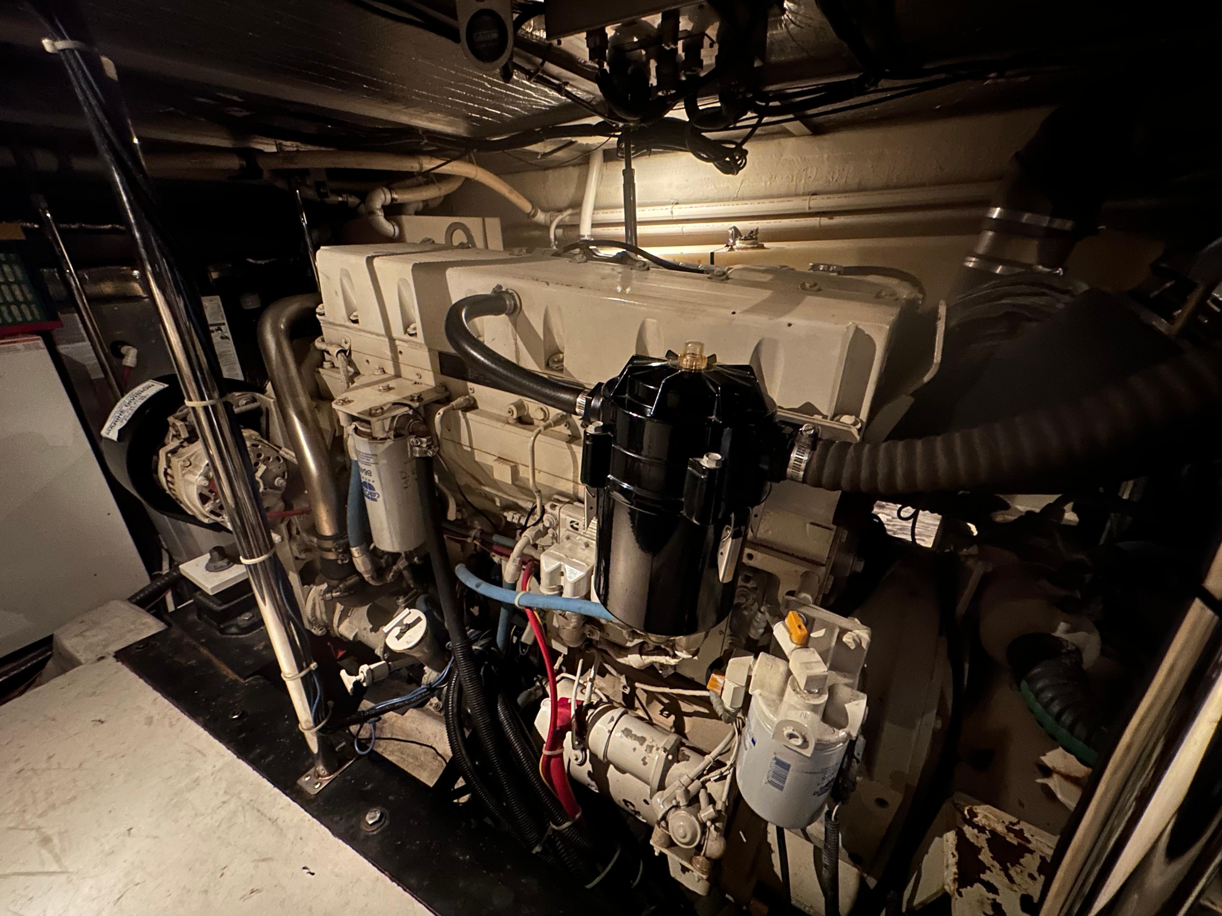 Engine room of a 2001 Carver 570 Voyager Pilothouse yacht.