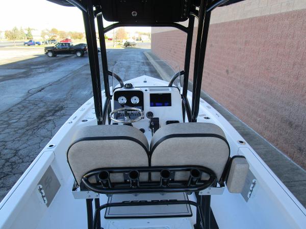 2025 Sea Pro 230 Bay boat interior with dual seats and control panel.