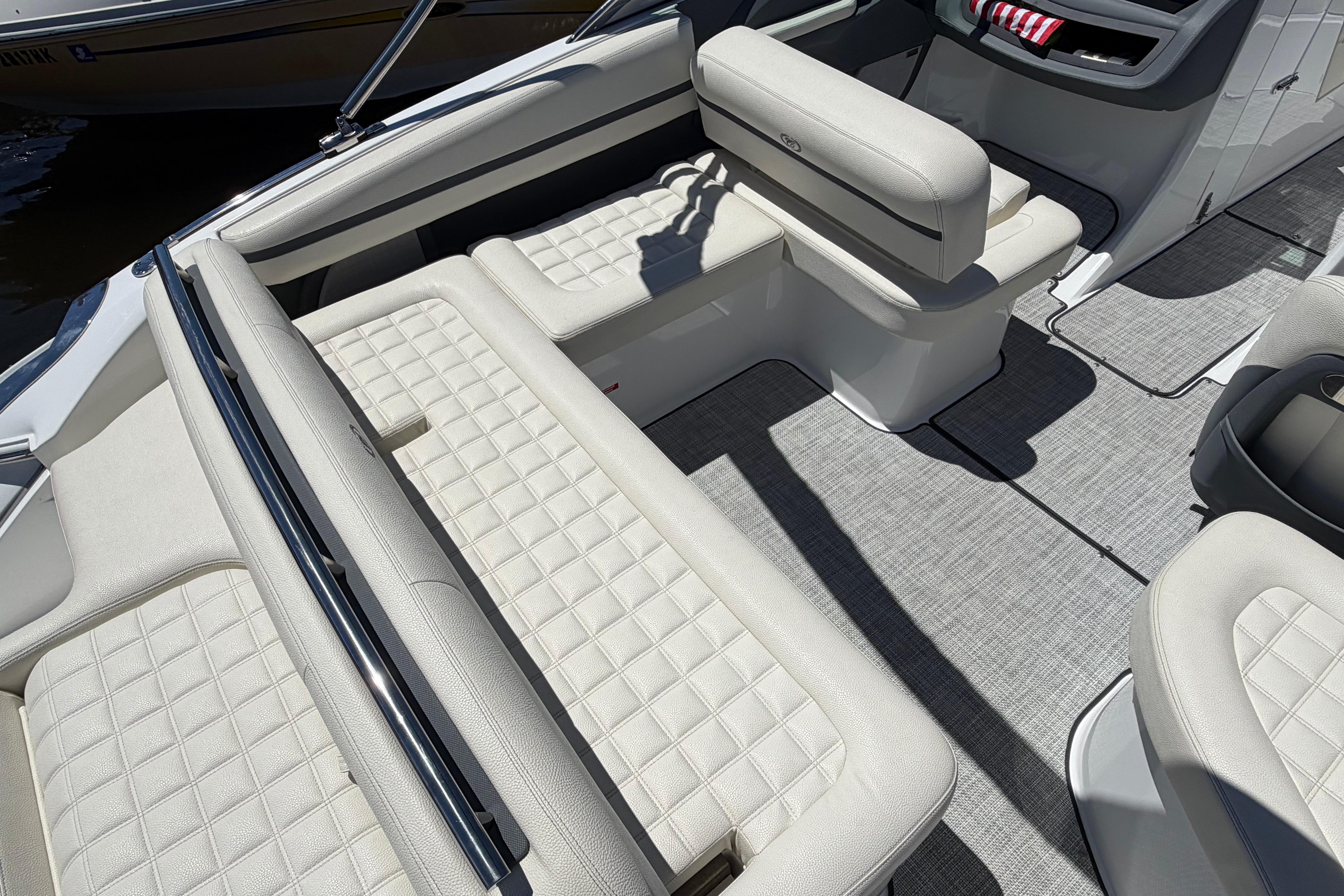 2020 Cobalt R3 boat interior with white quilted seating and gray flooring.
