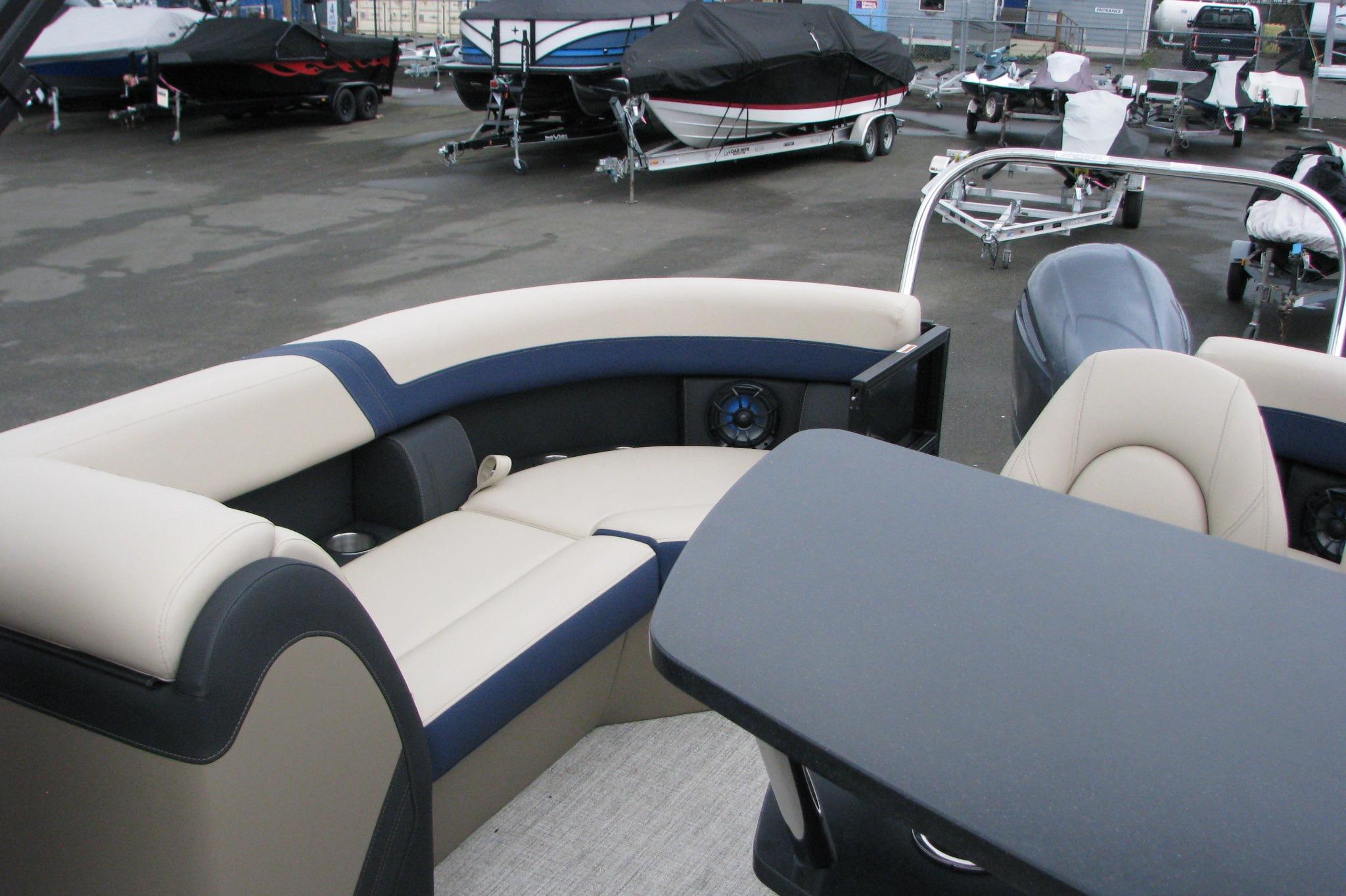 2026 Berkshire 24 E CTS pontoon boat interior with seating and table.
