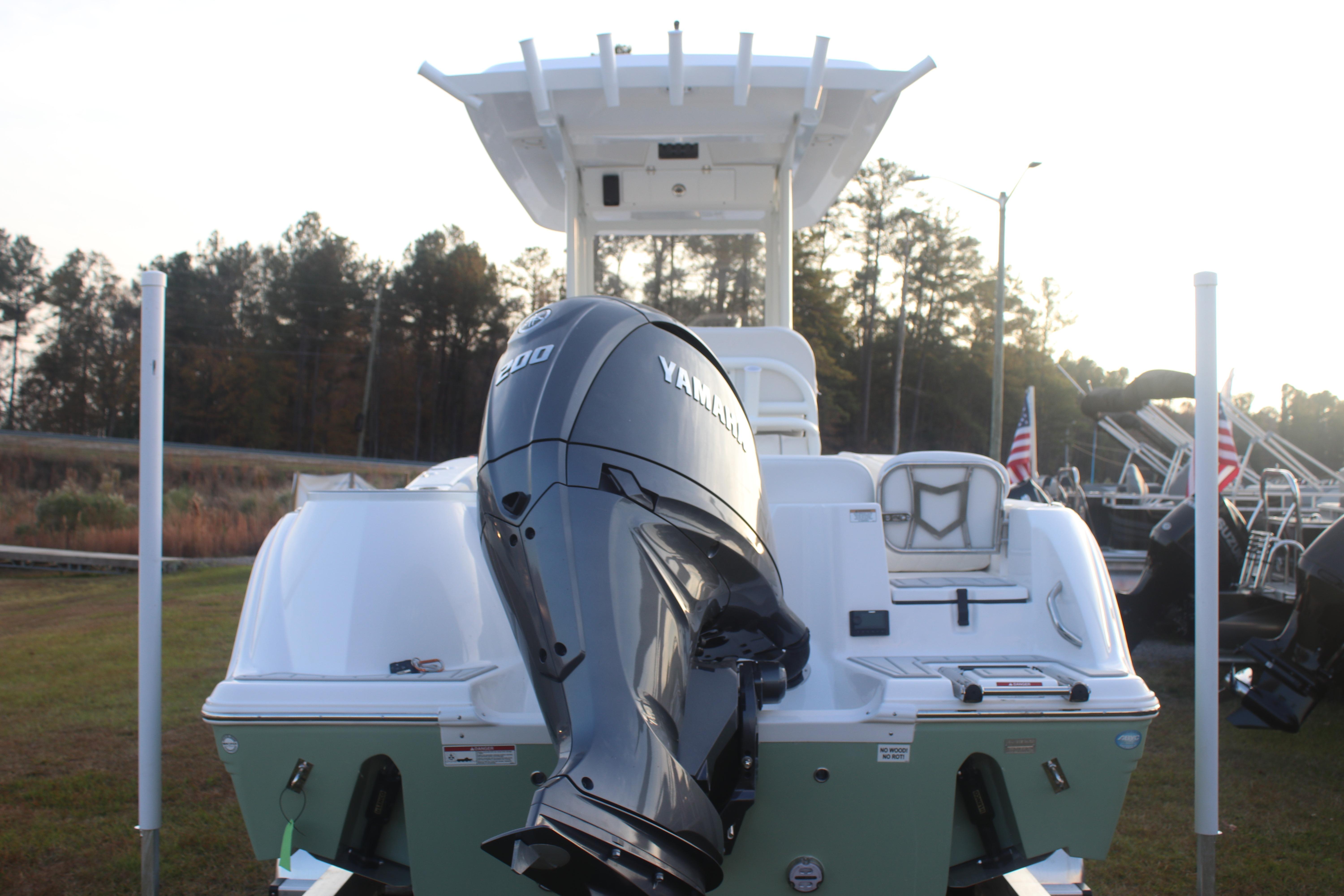 2026 Sea Fox 228 Commander boat with Yamaha engine, rear view.