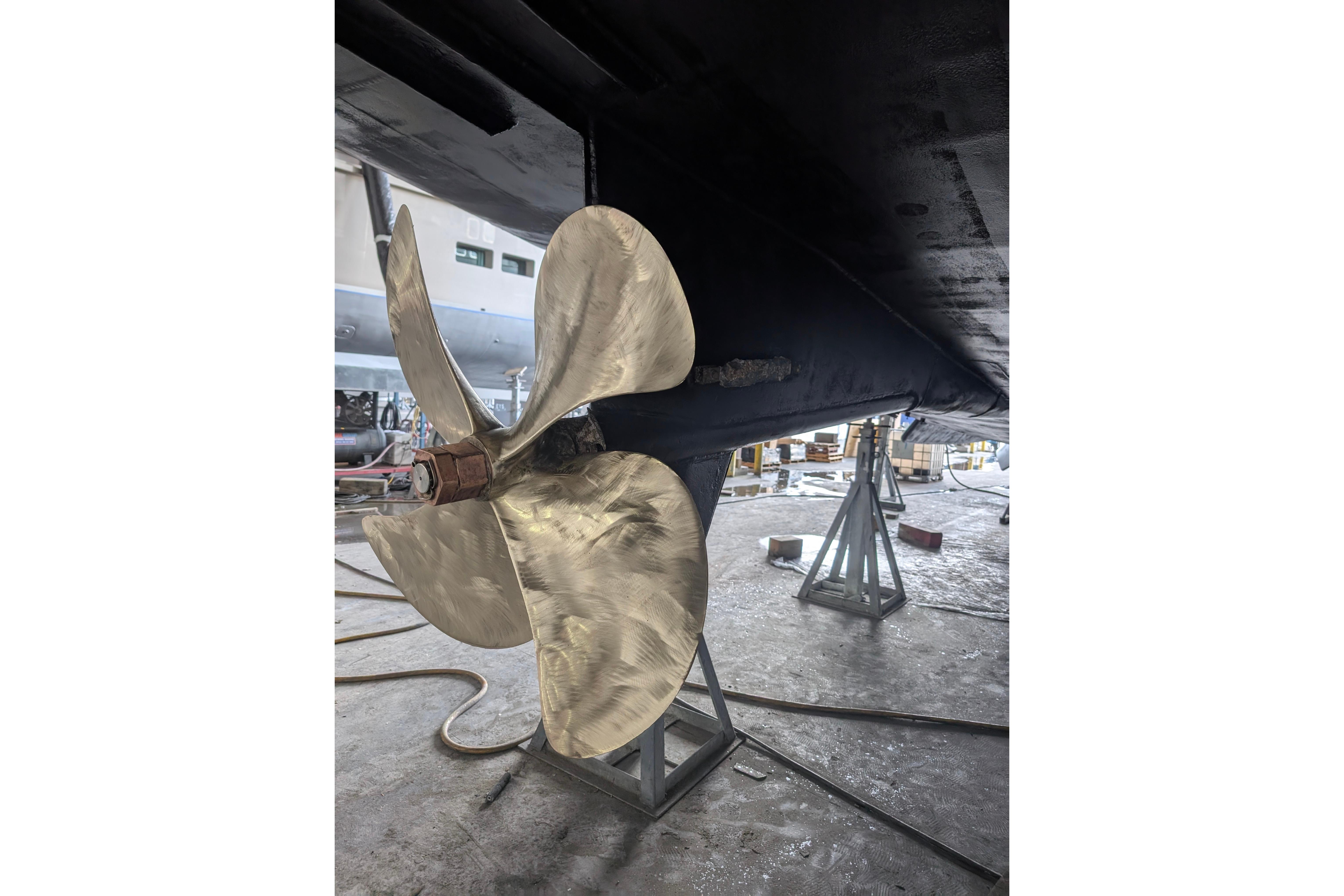 Polished propeller of 2001 Doggersbank yacht by Proteksan/Turquoise Yachts in dry dock.
