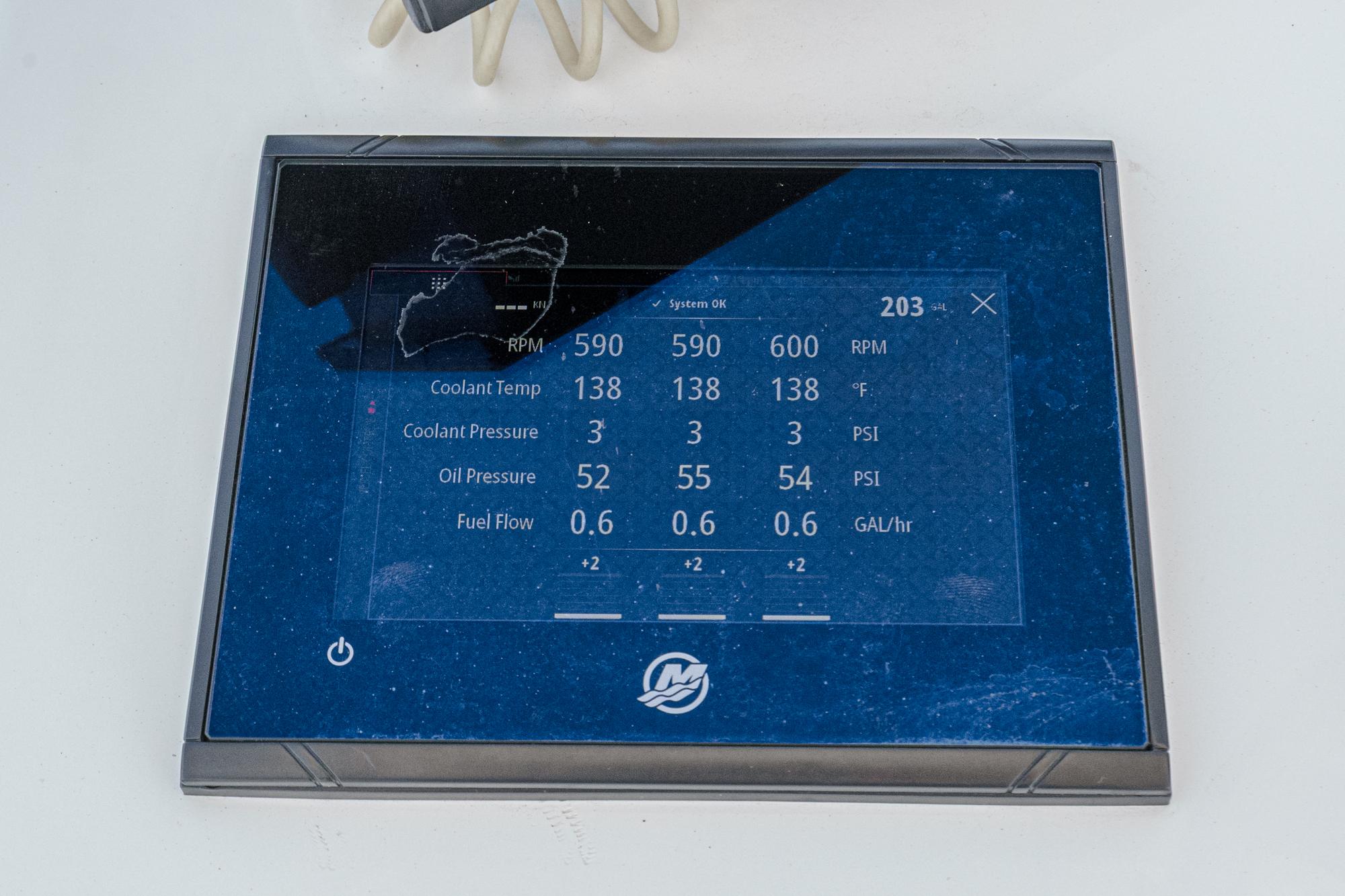 Digital display panel on a 2019 Fountain 38 CC boat showing engine metrics.