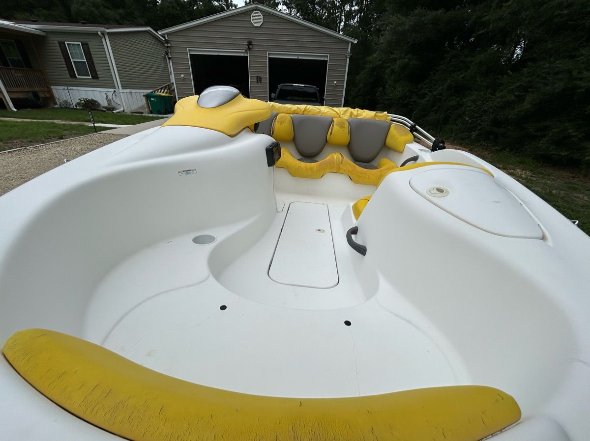 2004 Sea-Doo Sportster LE DI with yellow and gray seating.