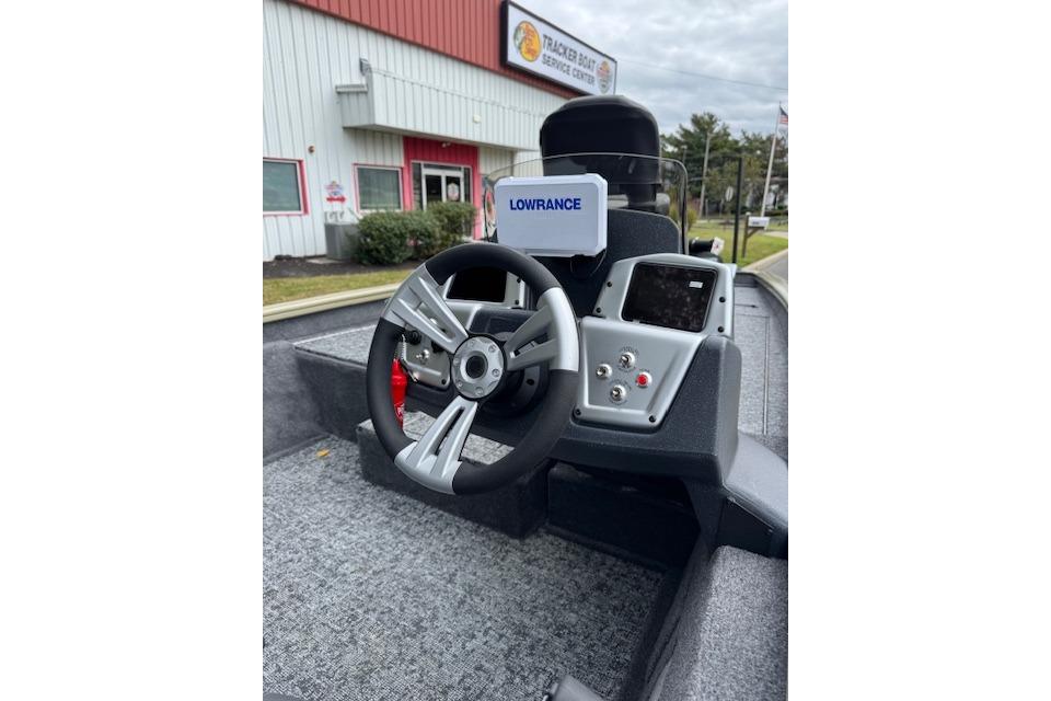 2026 Tracker Pro Team 190 boat dashboard with Lowrance electronics, steering wheel, and control panel.