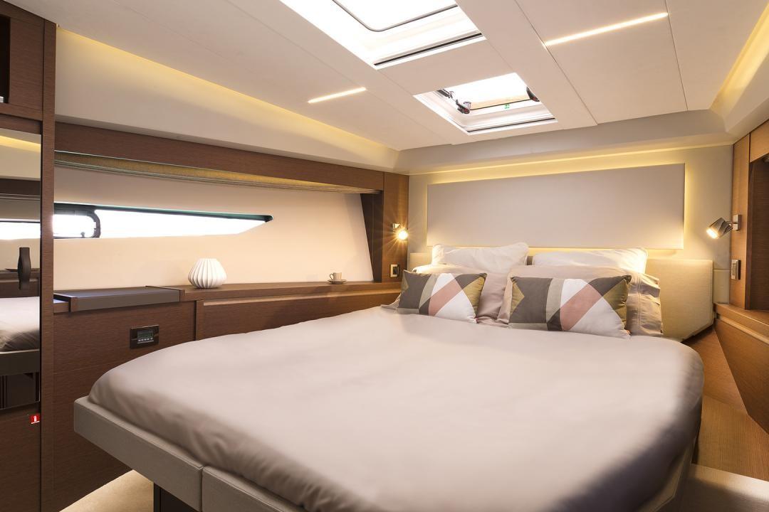 Manufacturer Provided Image: Luxurious bedroom interior of 2023 Prestige 520 S yacht with modern design and skylight.