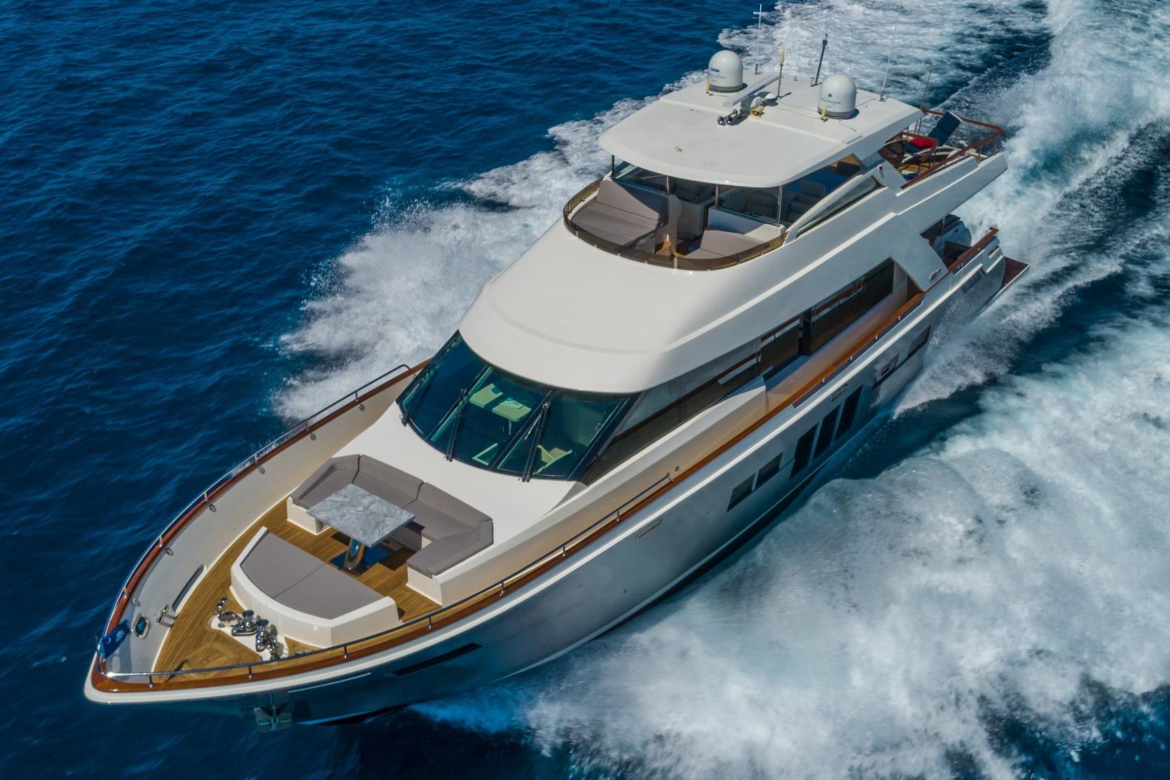 Luxurious 2012 Lazzara Breeze yacht cruising on open blue waters.