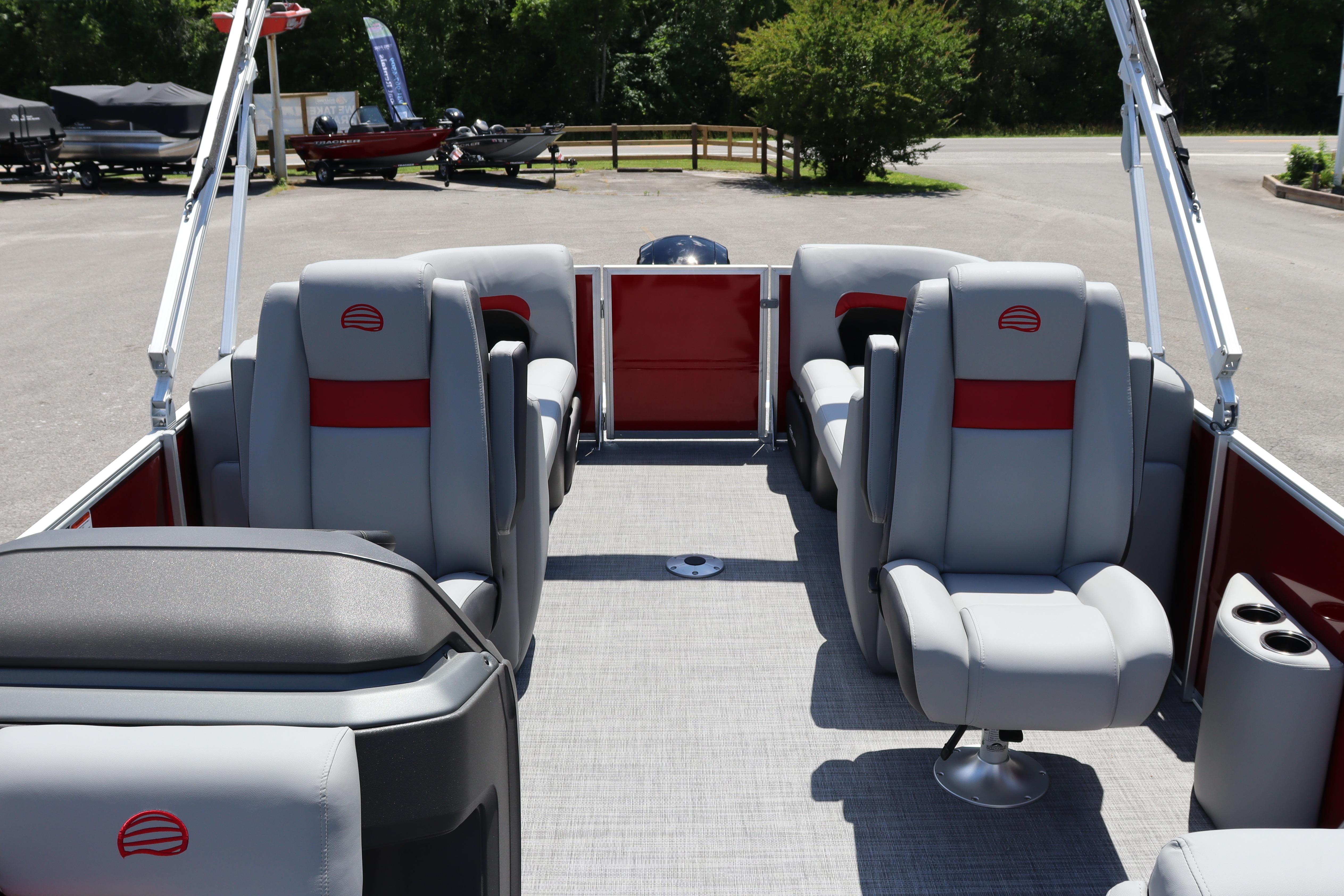 2026 Sun Tracker Party Barge 22 XP3 interior with gray and red seating.
