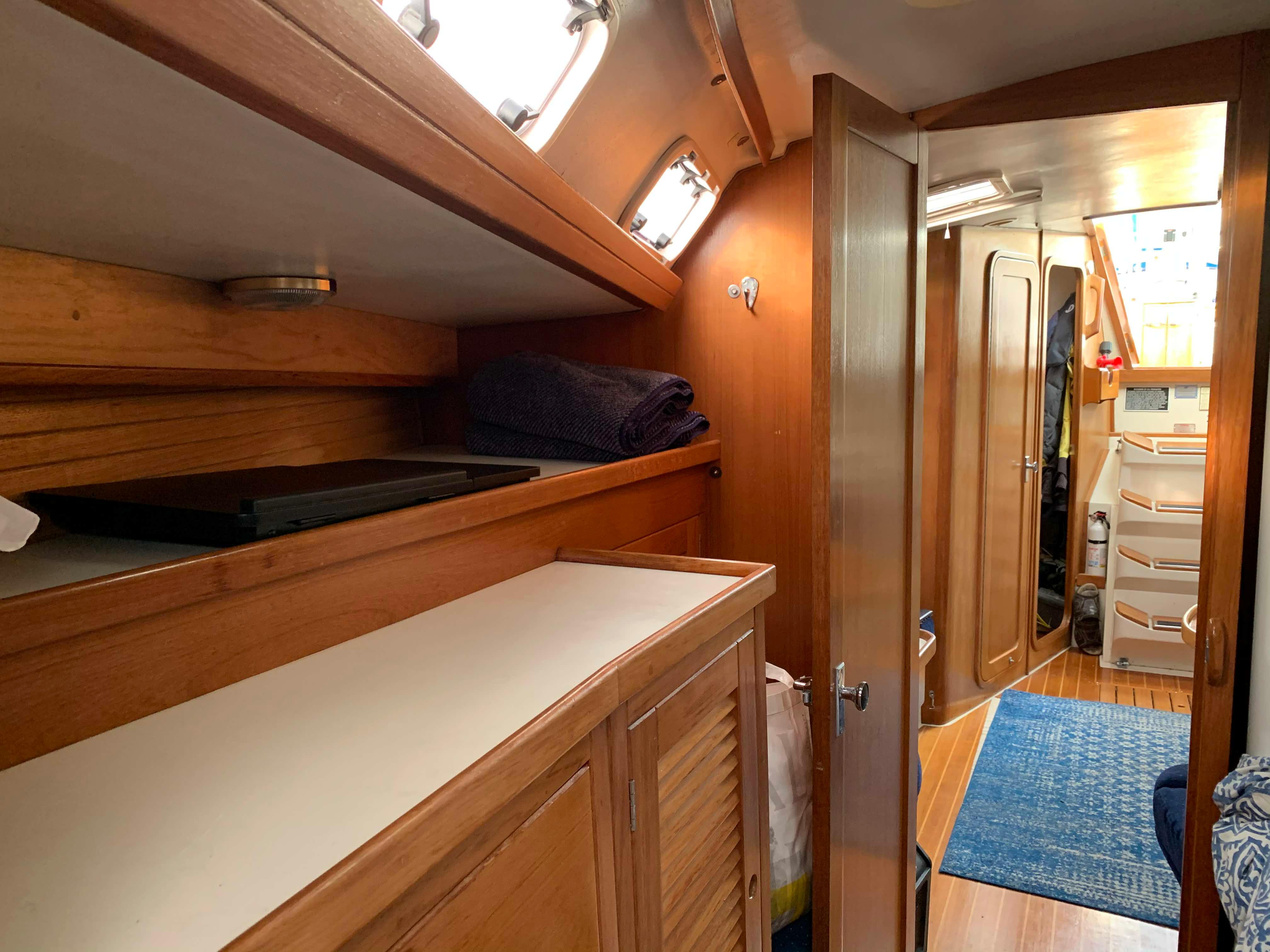 Interior of a 1992 Catalina 42 yacht with wooden furnishings.