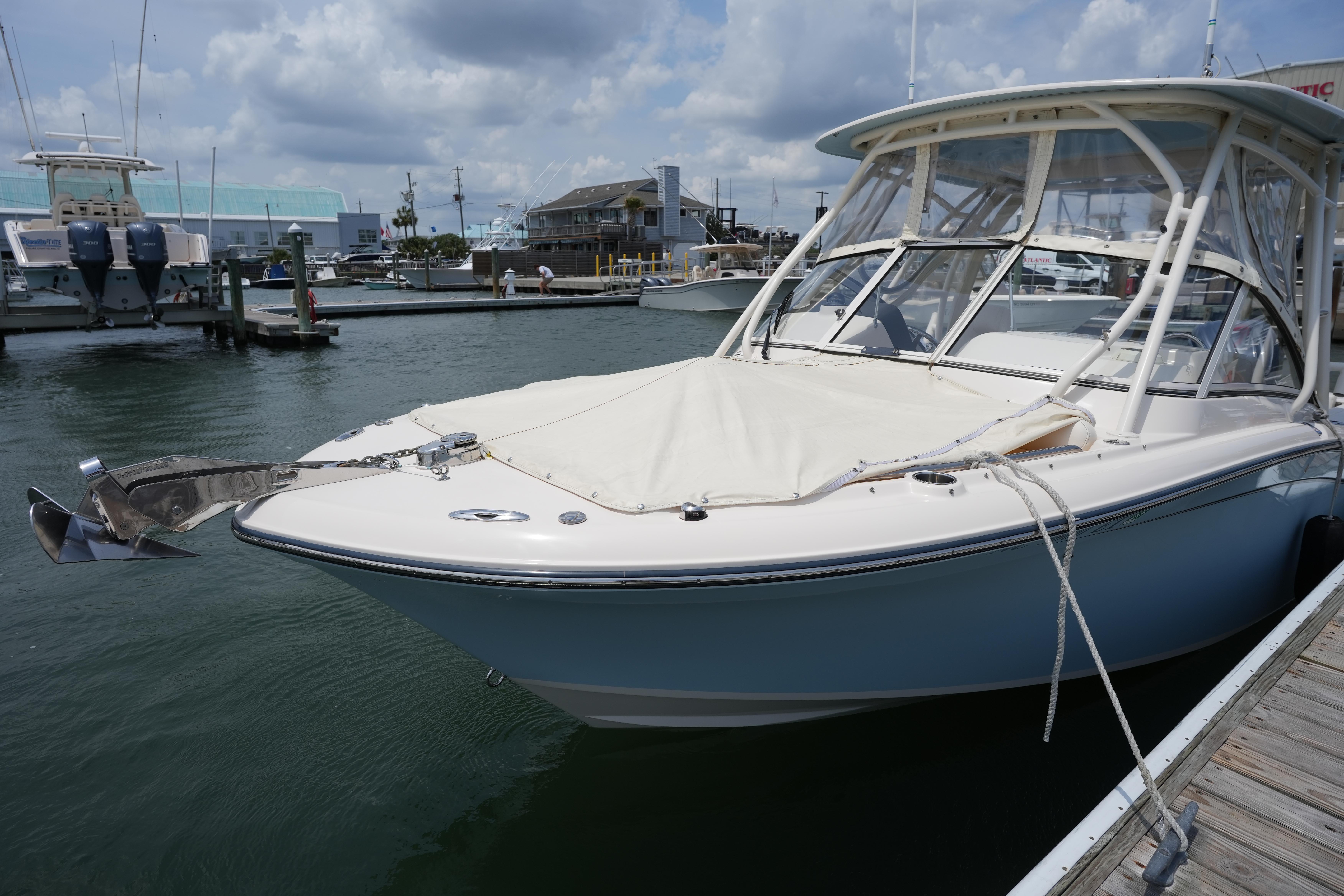 Grady-White Freedom 235 boat docked, 2021 model.