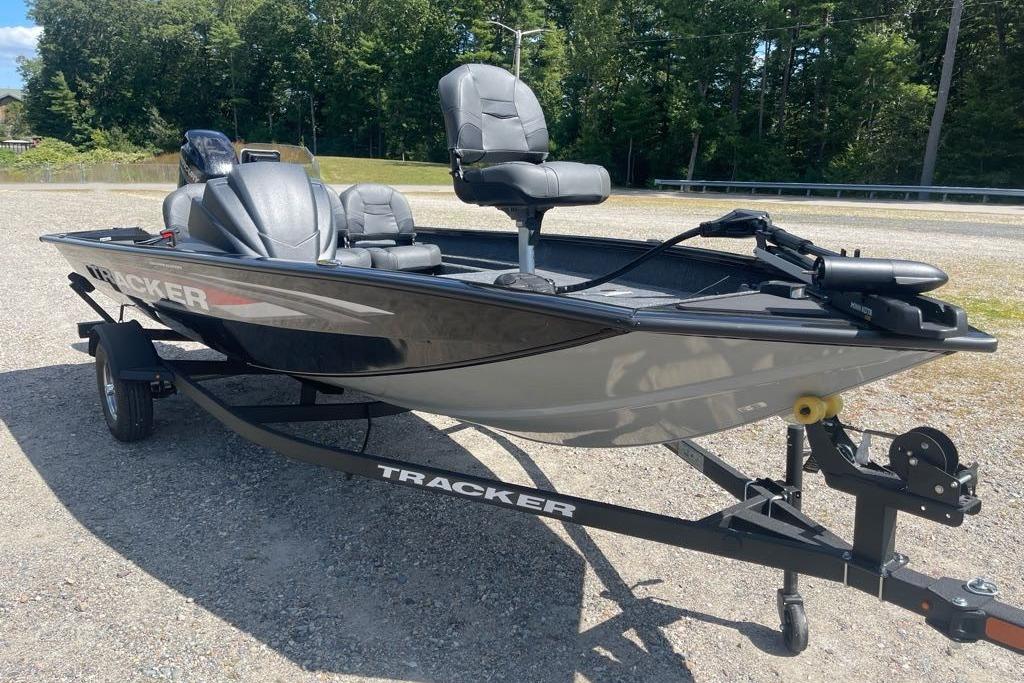 2026 Tracker Pro Team 175 Crappie Edition boat on trailer, parked outdoors.