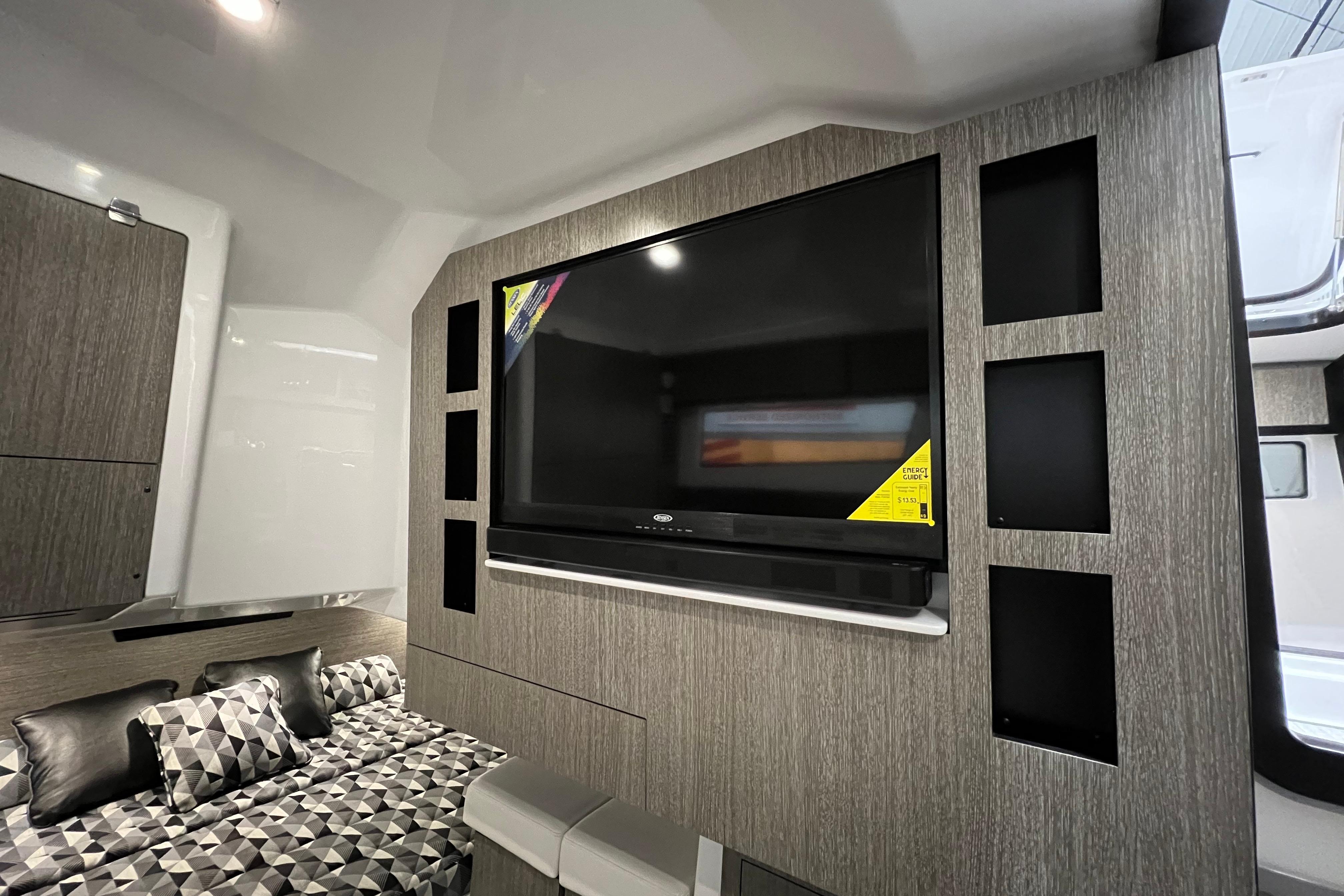 2023 Monterey 378SS Super Sport interior with modern TV setup and stylish seating area.