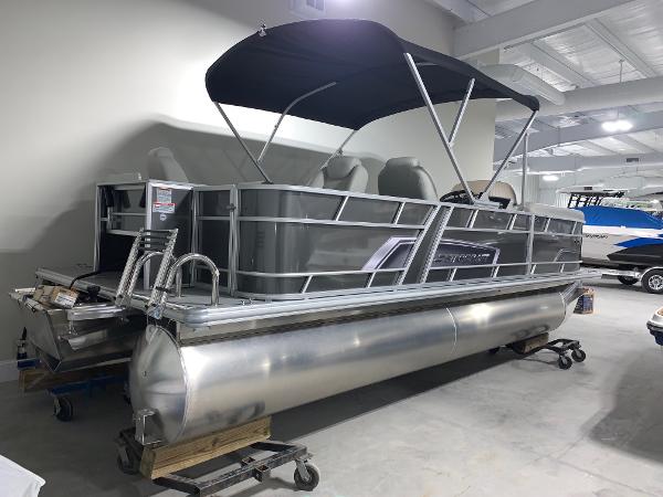 2024 Starcraft EX22 FD pontoon boat in showroom.