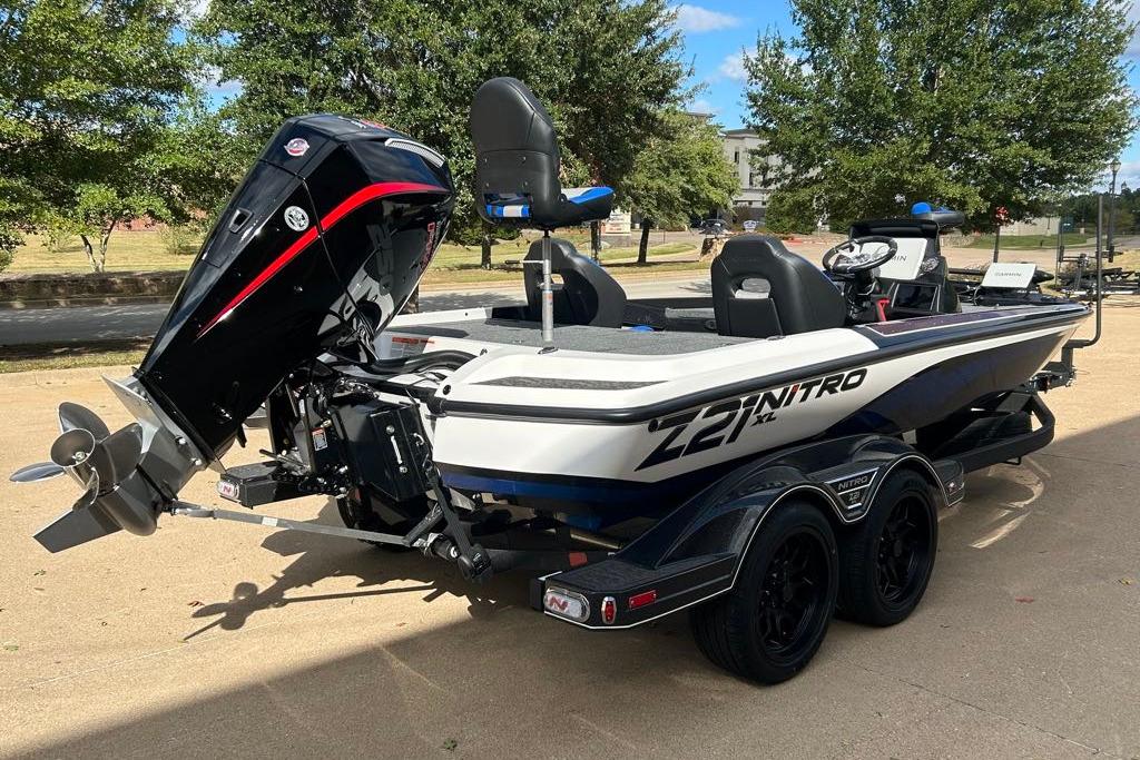 2026 Nitro Z21 XL Pro boat with powerful outboard motor, parked on a trailer.