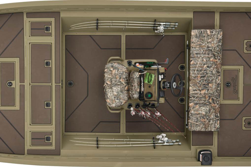 2024 Tracker Grizzly 2072 CC boat interior with fishing rods and camo seating.