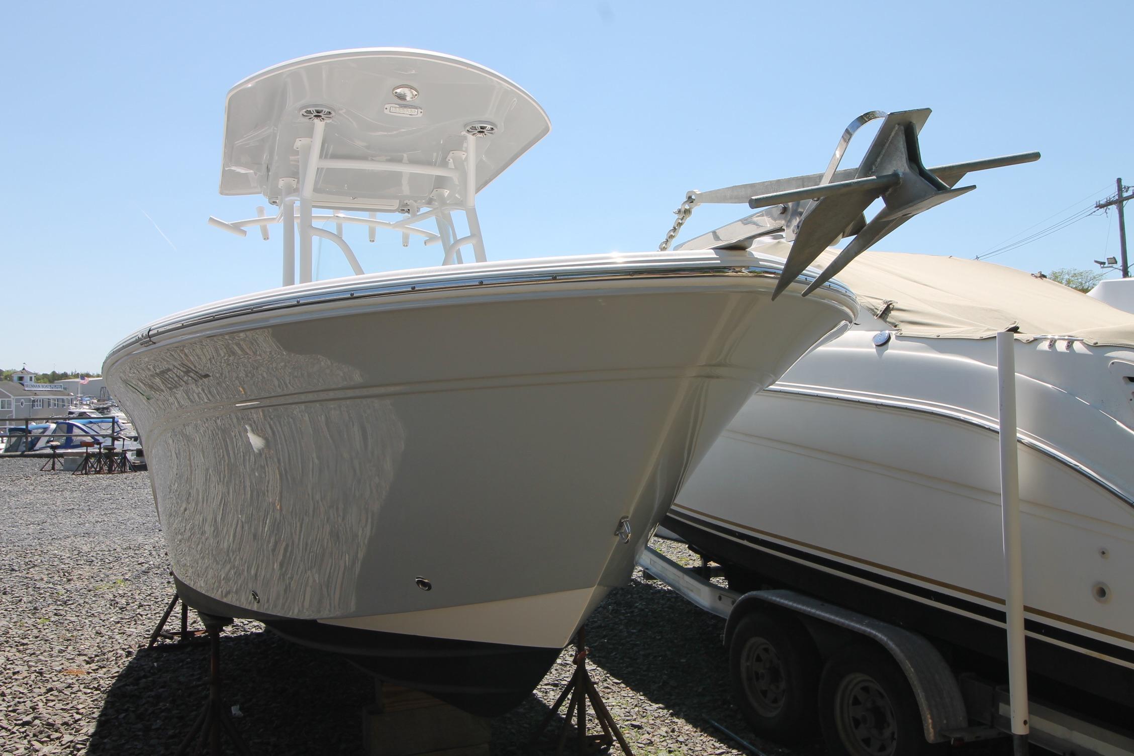 2018 Sea Fox 226 Commander boat on trailer, displayed outdoors.