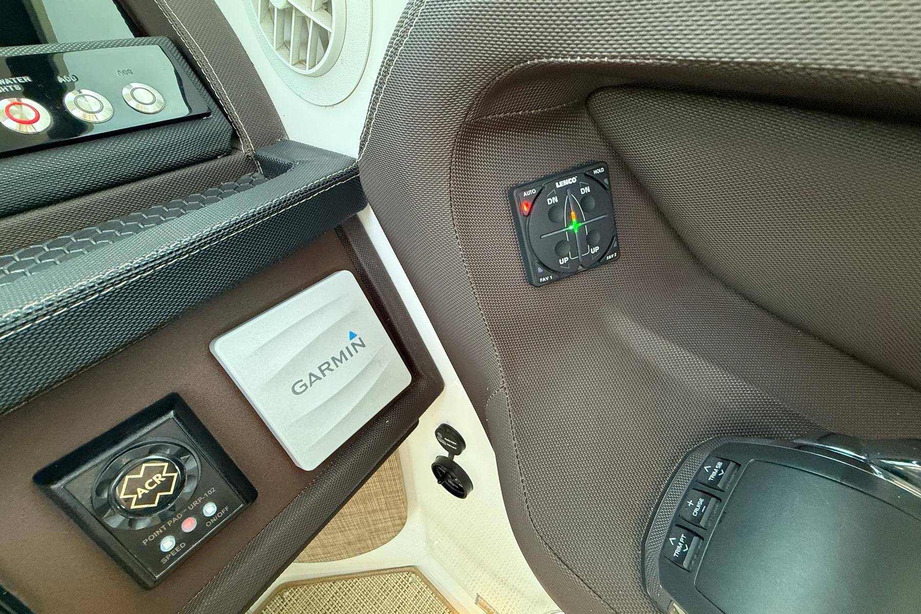 Control panel of a 2017 Cobalt A40 Coupe featuring Garmin and Lenco systems.