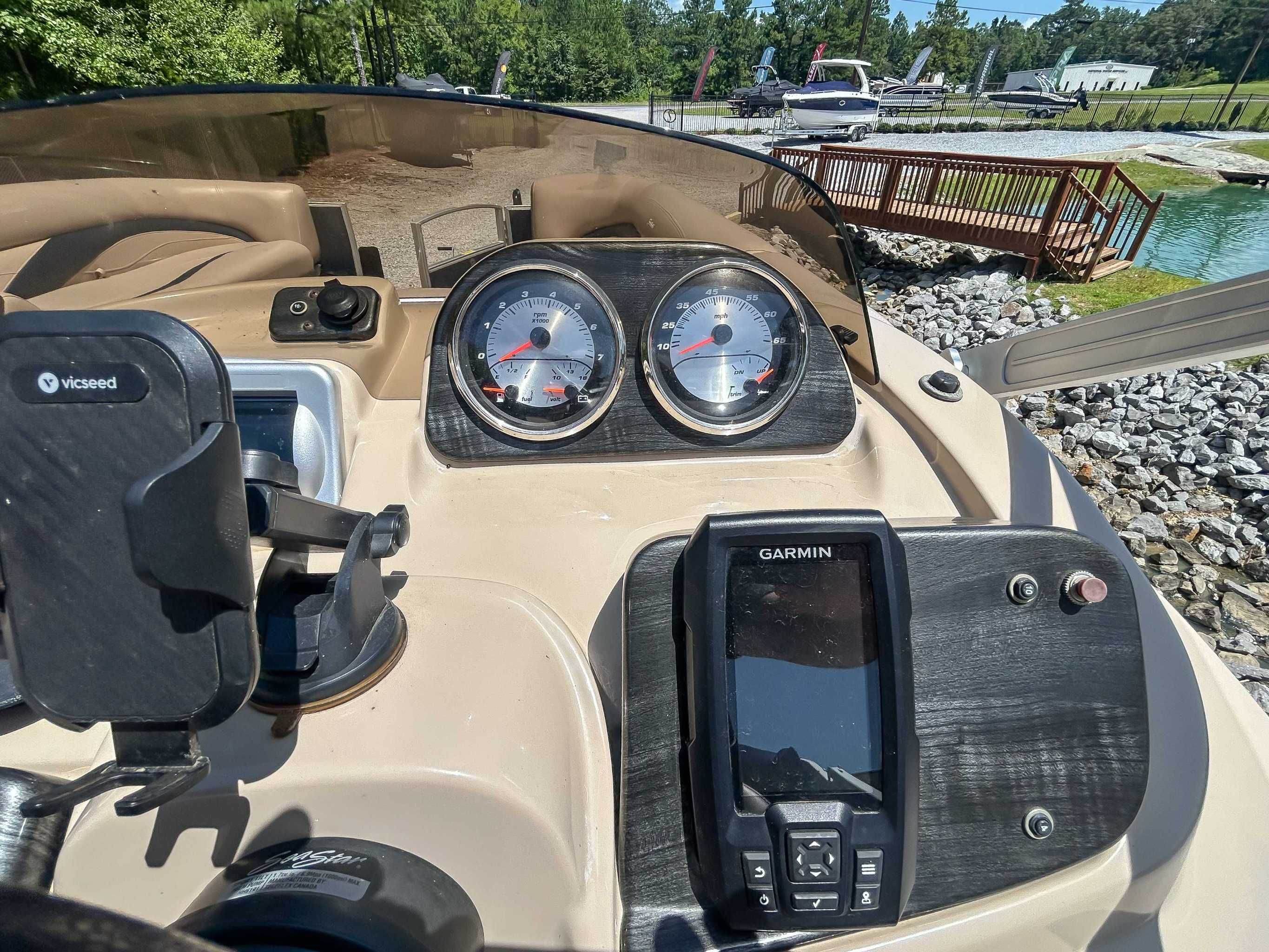 Dashboard of a 2014 Sweetwater 200 Premium Edition boat with Garmin device.
