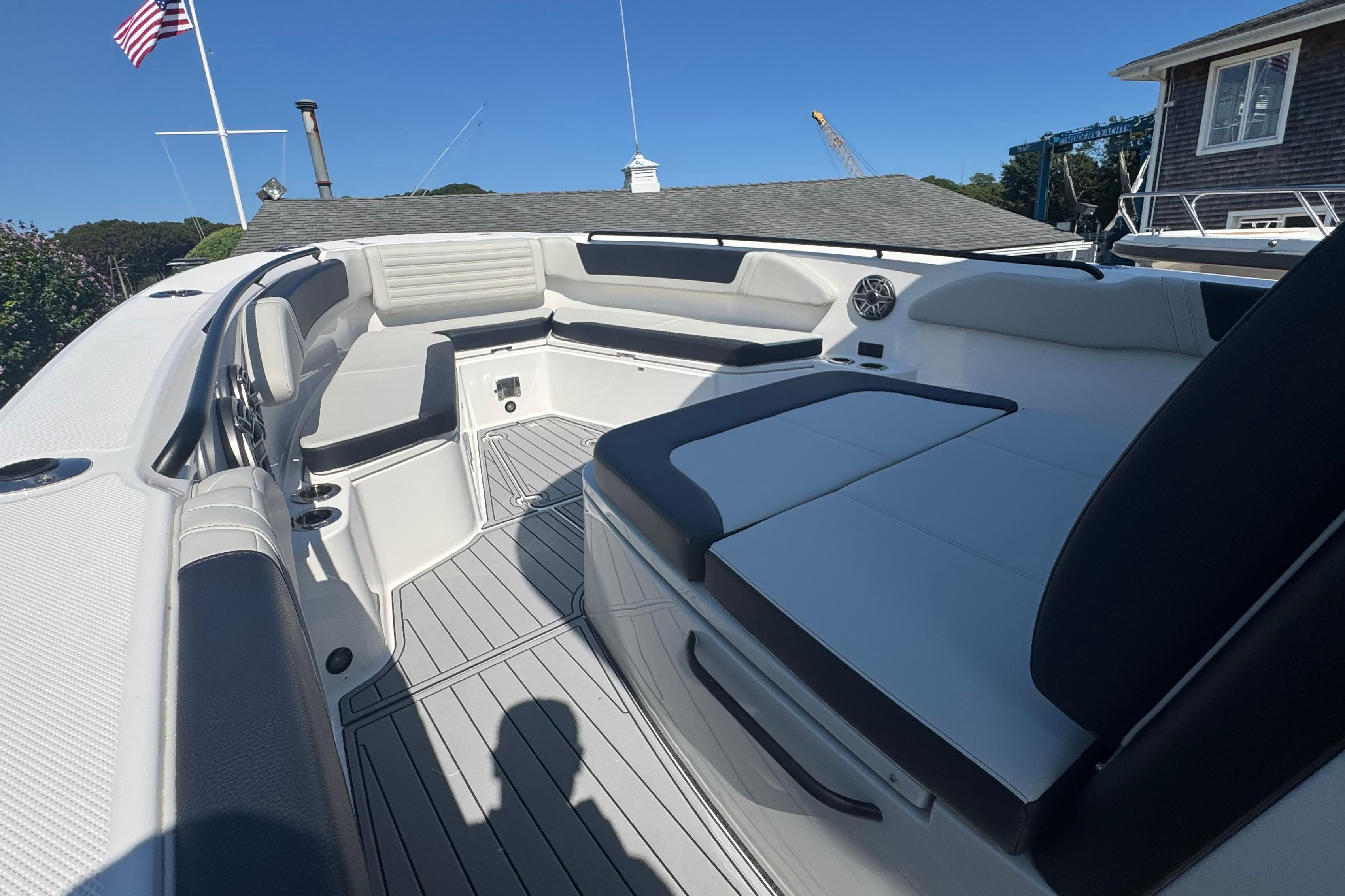 2025 Edgewater 340CC boat interior with cushioned seating and modern design.