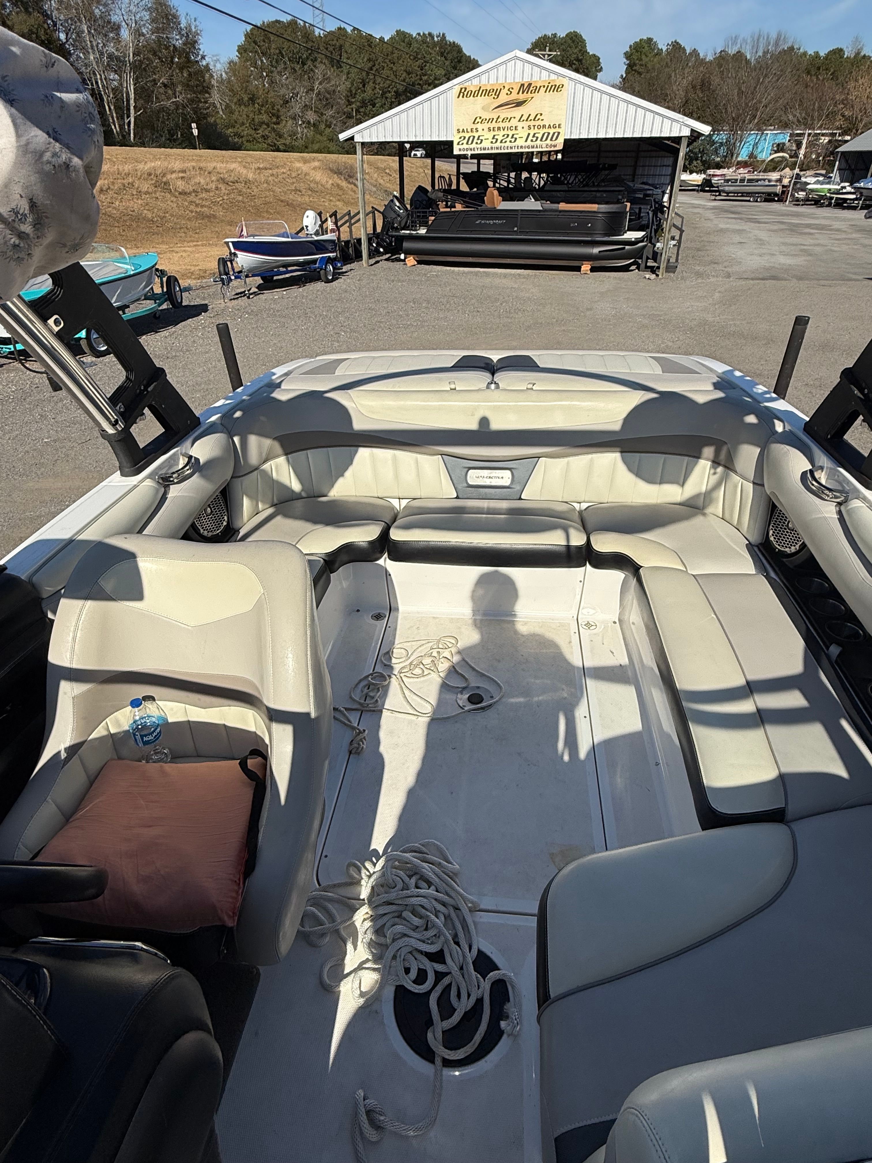 Interior view of a 2013 Malibu Wakesetter 22 MXZ with seating and rope.
