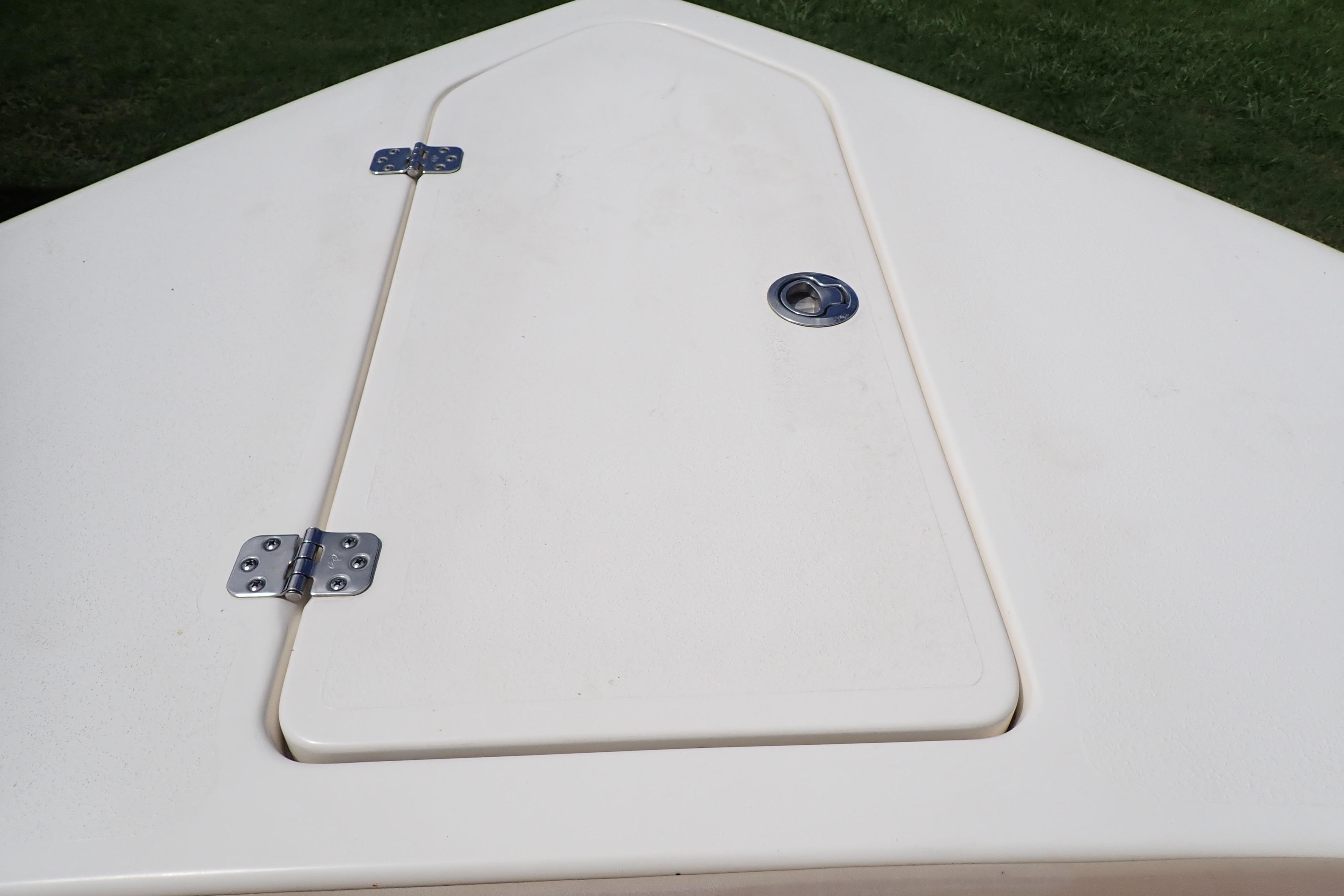 2019 Key West 263 FS boat hatch with metal hinges and latch.