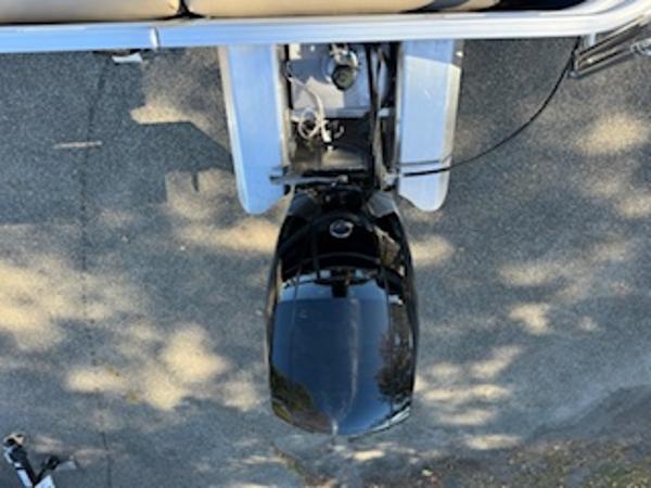 Overhead view of a 2025 Sun Tracker Fishin' Barge 22 DLX boat motor.