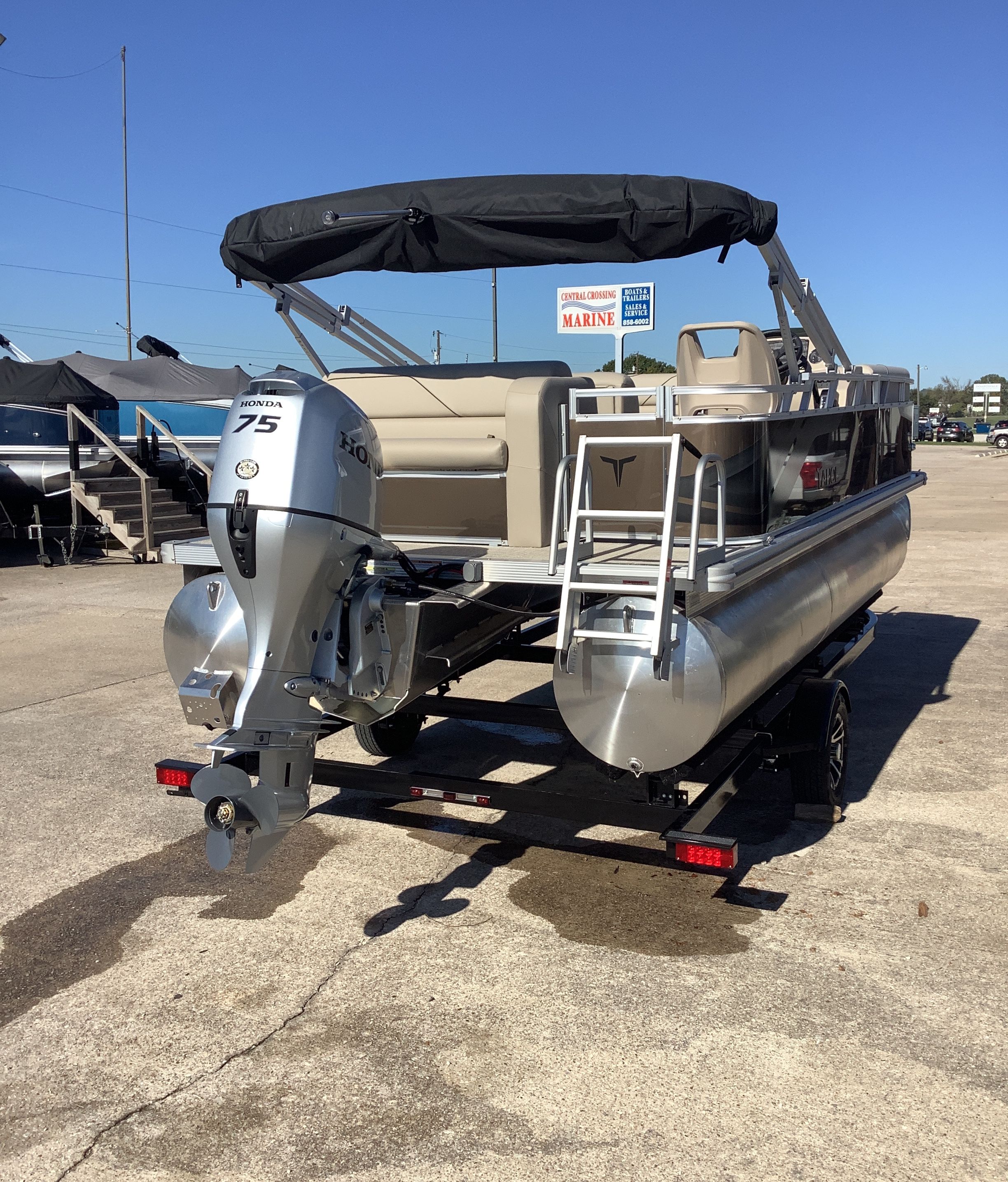 2026 Tahoe 1980 Sport Cruise pontoon boat with Honda 75 engine.