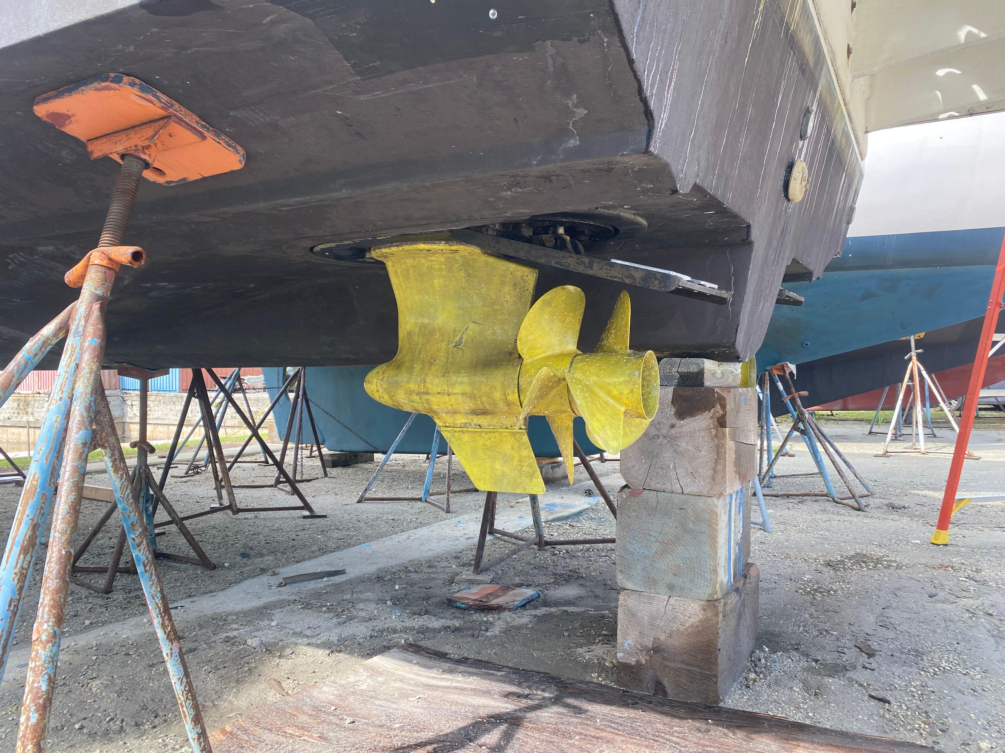 2012 Sea Ray 450 Sundancer boat propeller and hull on dry dock.