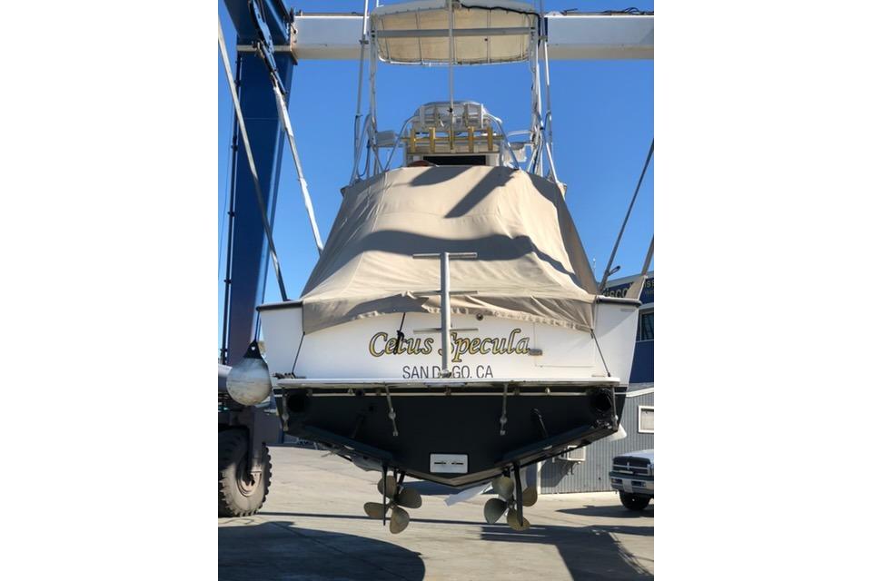 1999 Albemarle 305 Express Fisherman boat in San Diego, CA, on a lift.