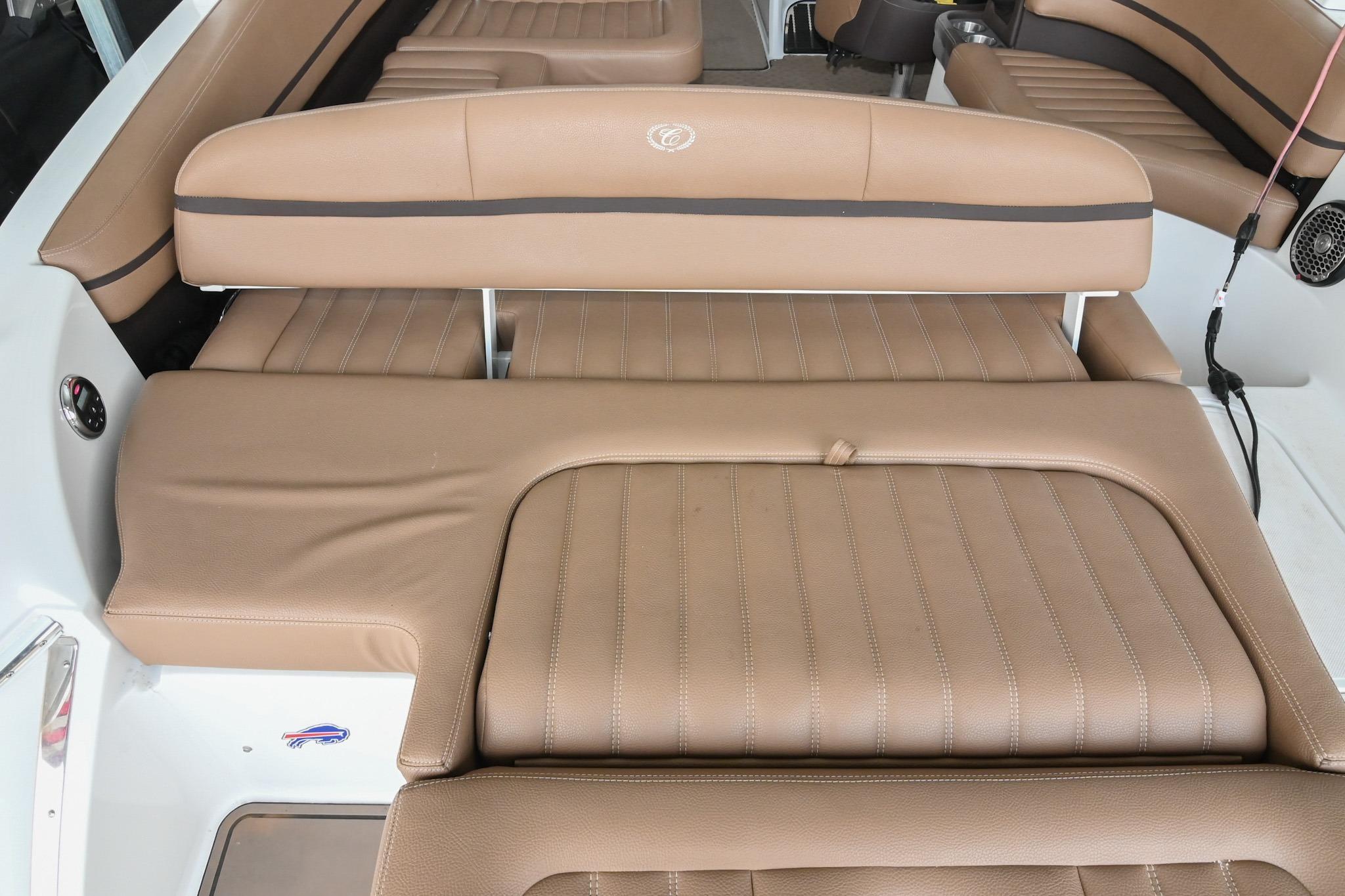 2015 Cobalt R7 boat interior with tan leather seating and sleek design.