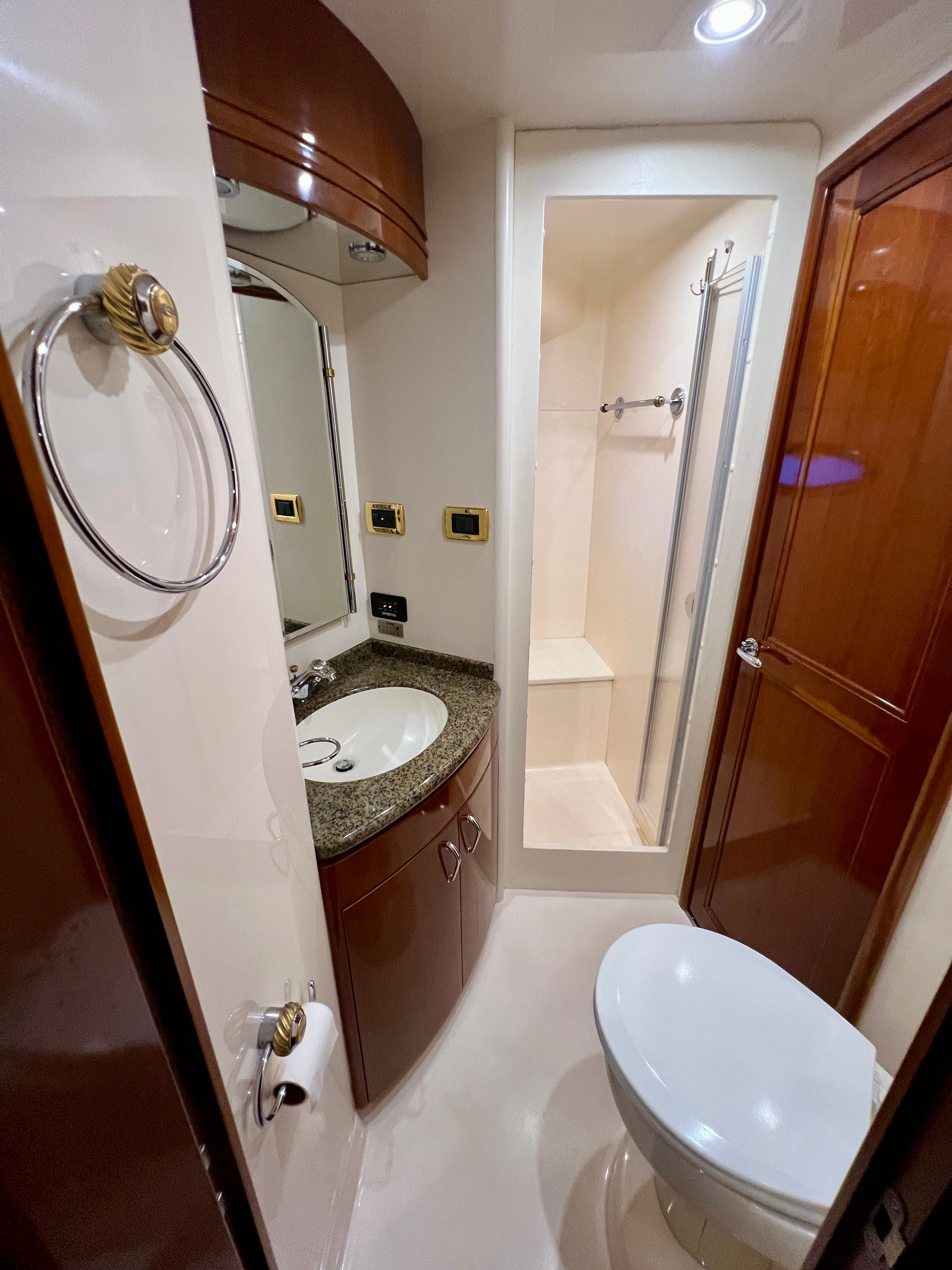 Luxurious bathroom in a 2005 Carver 560 Voyager Sky yacht.