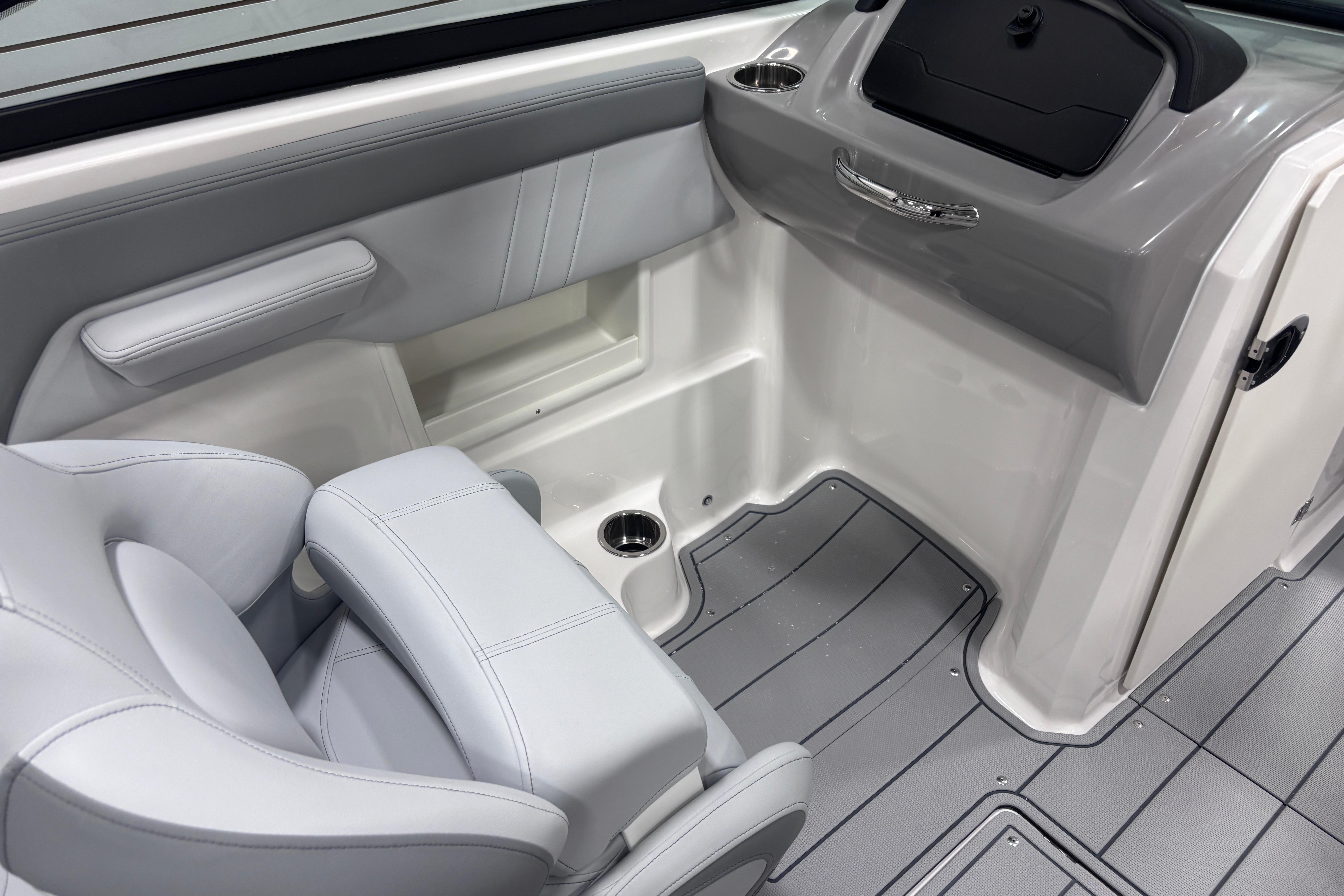 2026 Chaparral 23 SSi boat interior with sleek seating and modern dashboard design.
