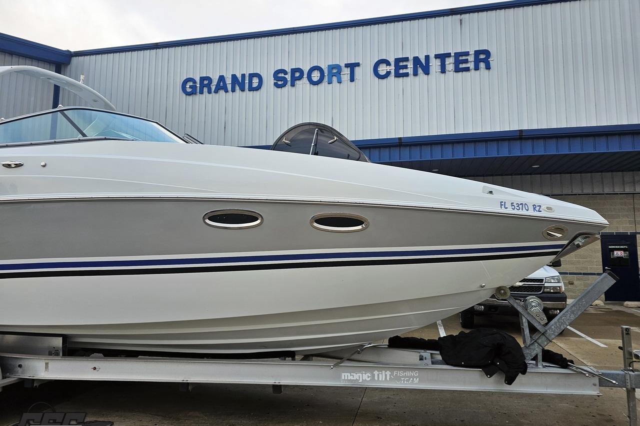 2008 Baja 335 Performance boat on trailer at Grand Sport Center.