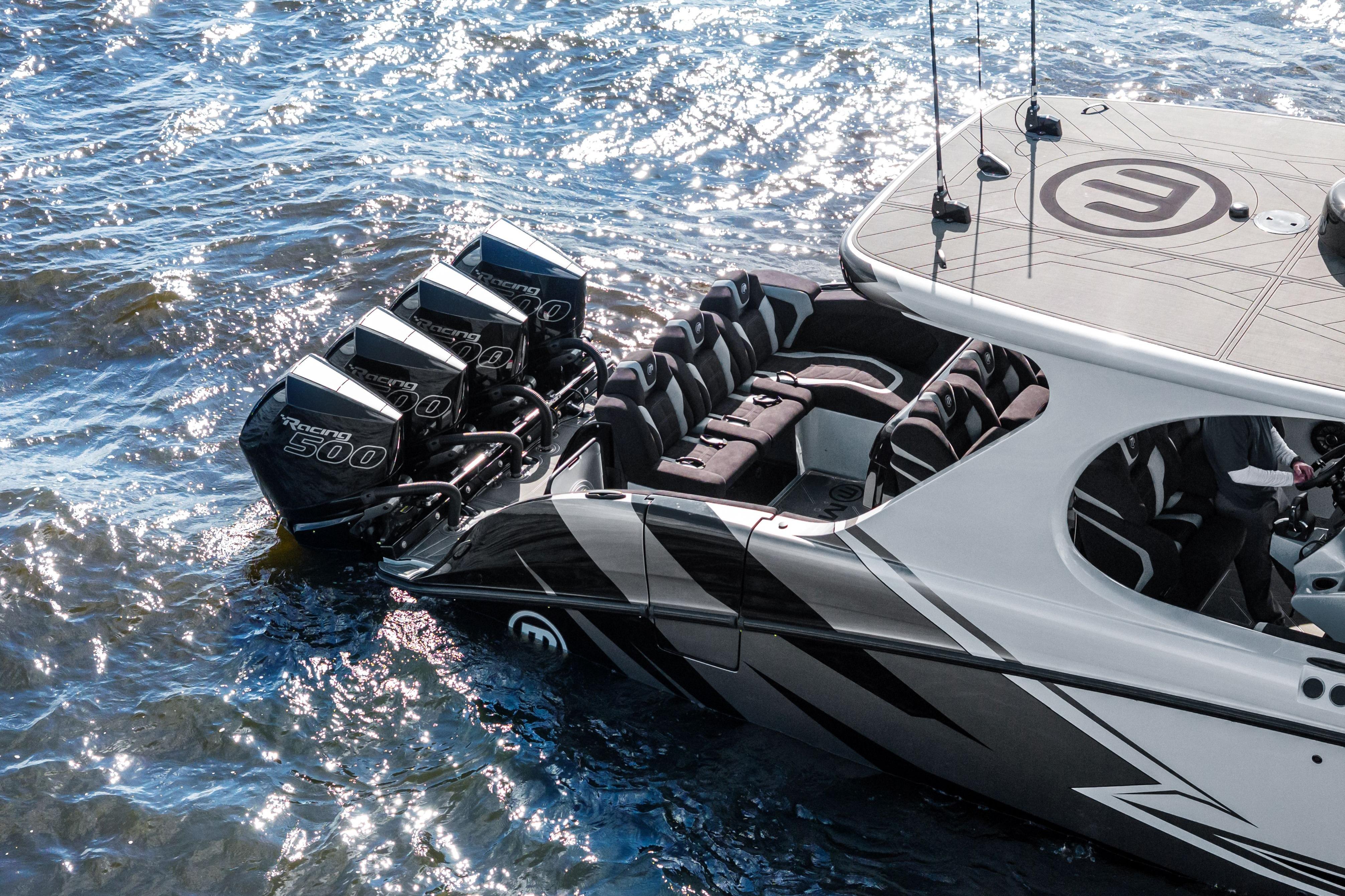 2027 Mystic Powerboats M4200 with quad Racing 500 engines on water.