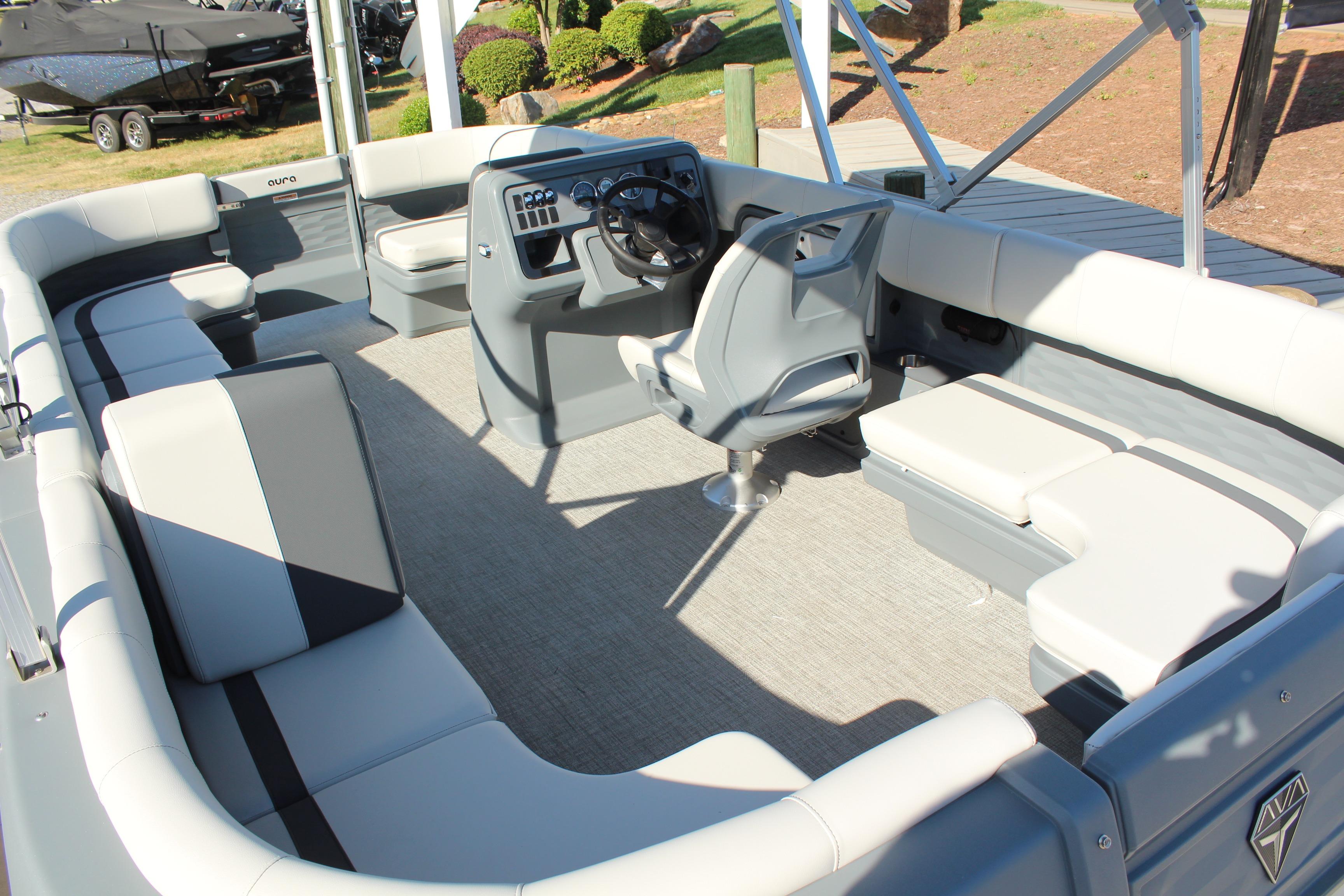 2026 Tahoe Pontoon Aura interior with spacious seating and modern helm design.