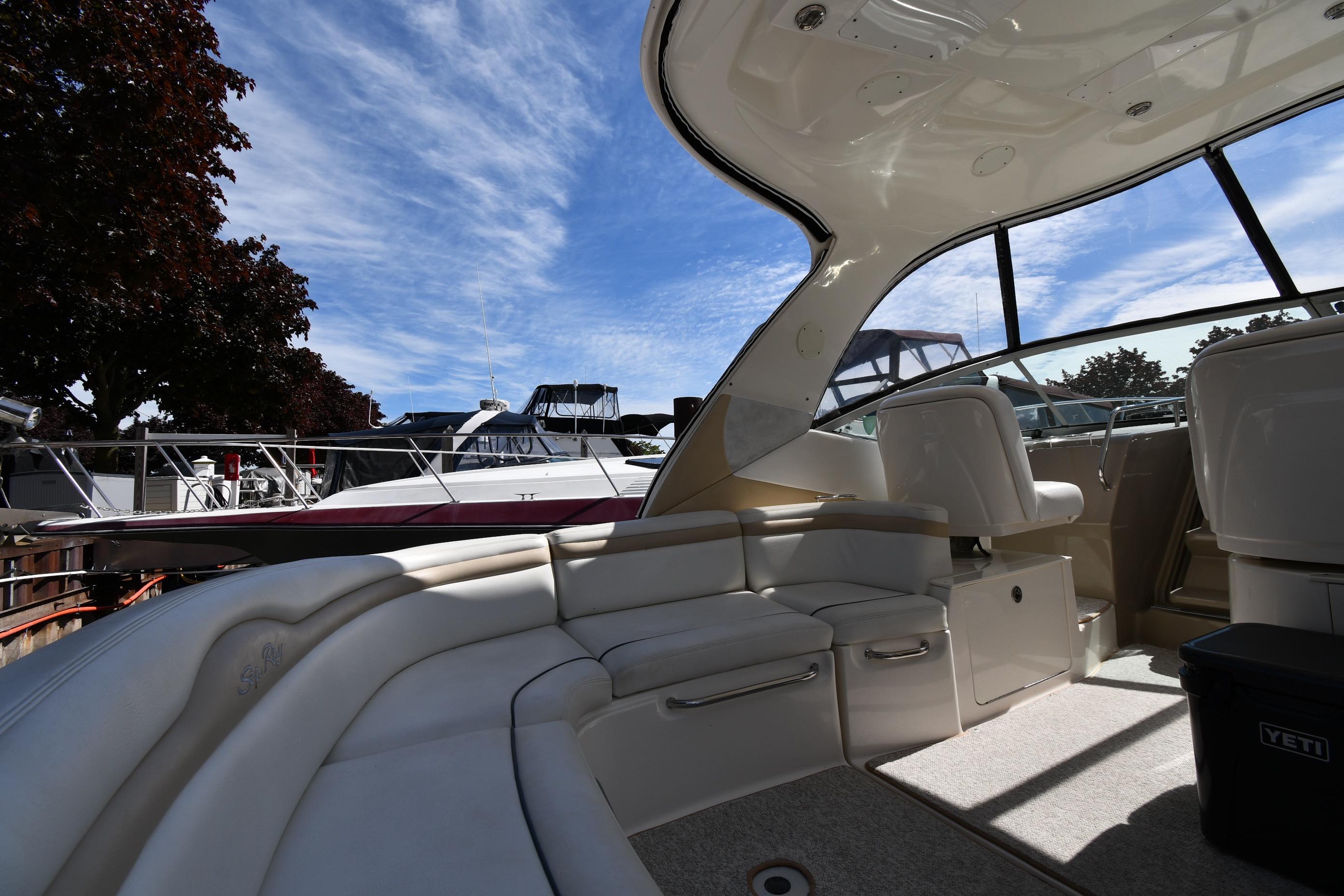 Interior view of 2008 Sea Ray Sundancer 350 yacht with seating and clear sky.