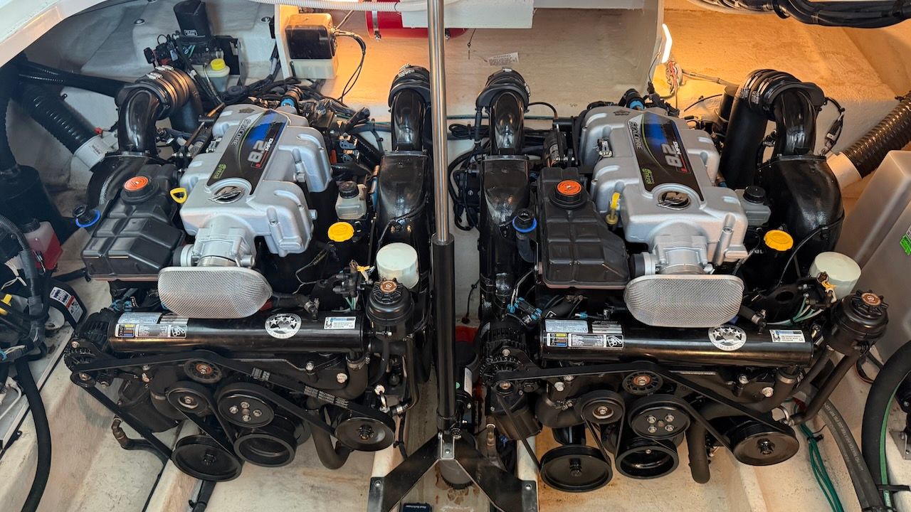 Two powerful engines in the engine room of a 2011 Sea Ray Sundancer 370.
