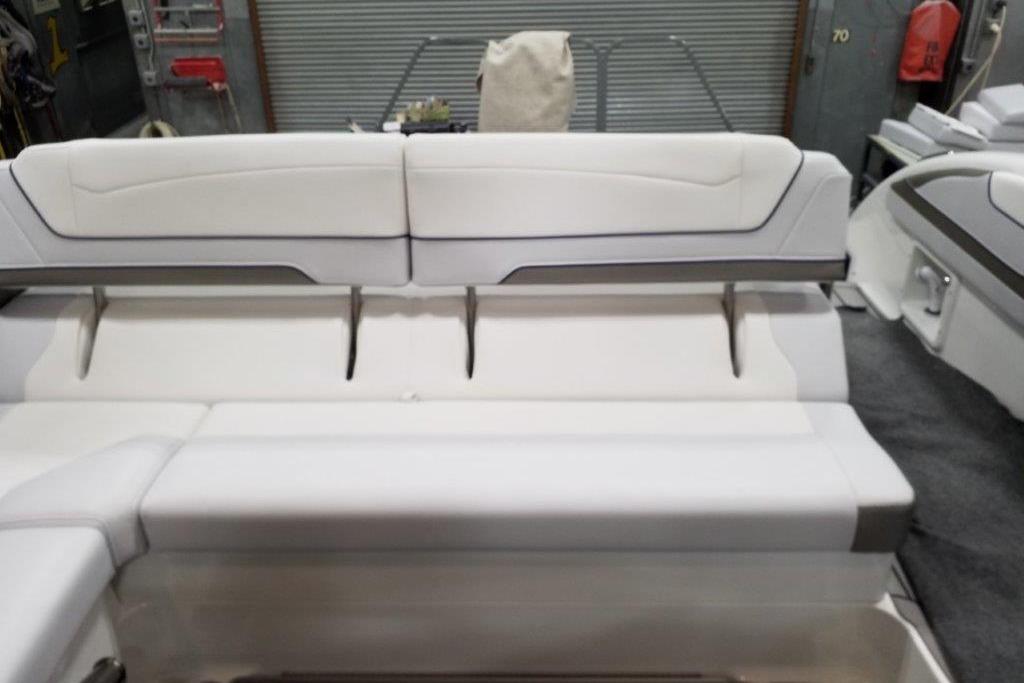 2021 Formula 350 Sun Sport boat interior with white seating and modern design.