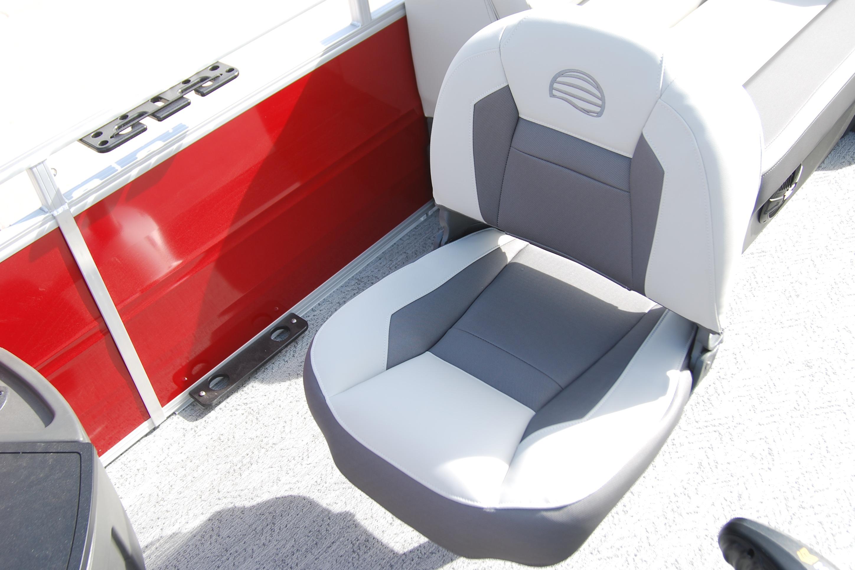 Sun Tracker Fishin' Barge 22 XP3 2026 boat seat with red paneling and gray upholstery.