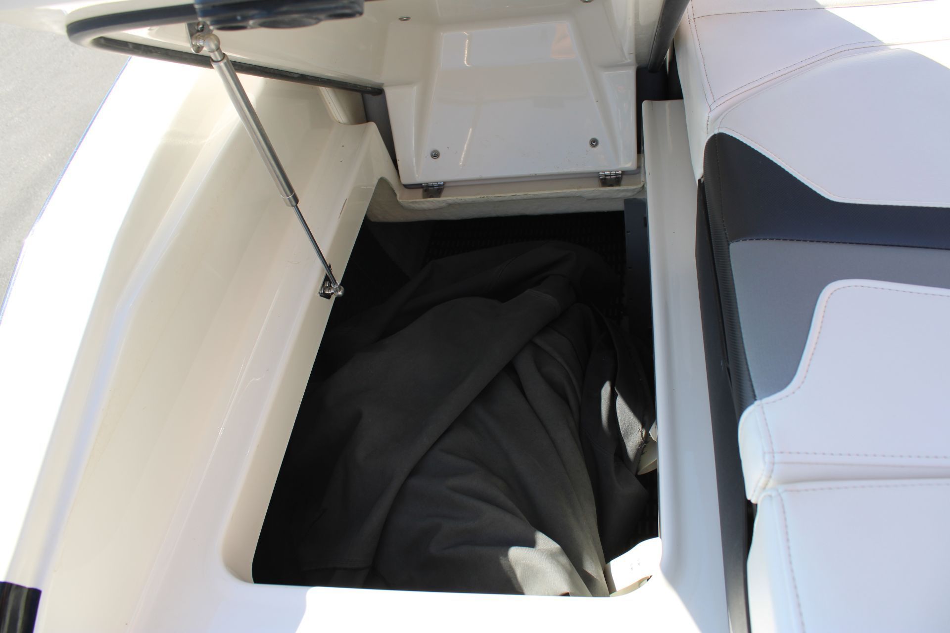 Storage compartment in 2013 Monterey 234SS Super Sport boat.